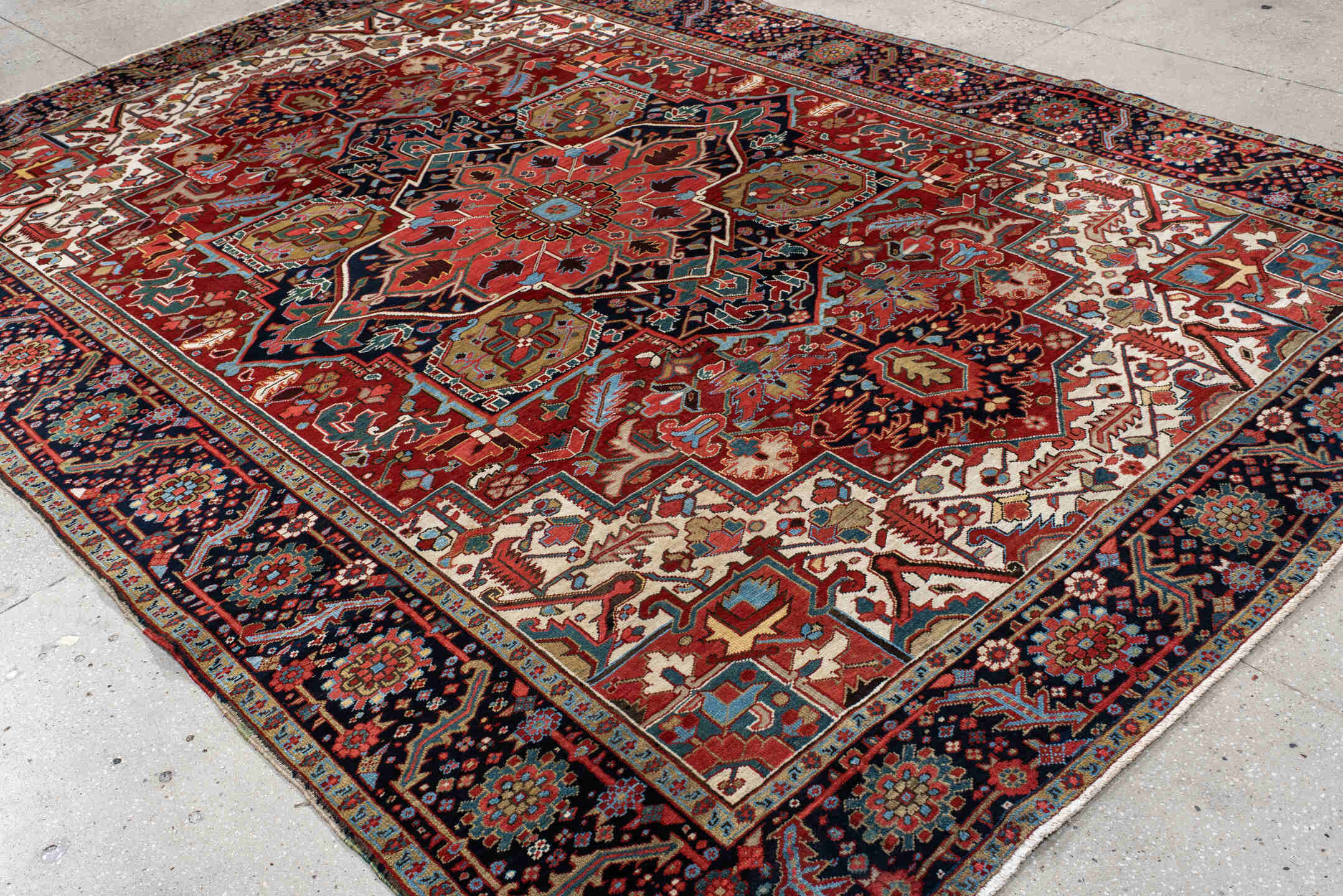 8' x 12' one-of-a-kind handmade vintage Heriz large size rug. Color palette: rust, ivory, navy, sky_blue, coral, sage, camel