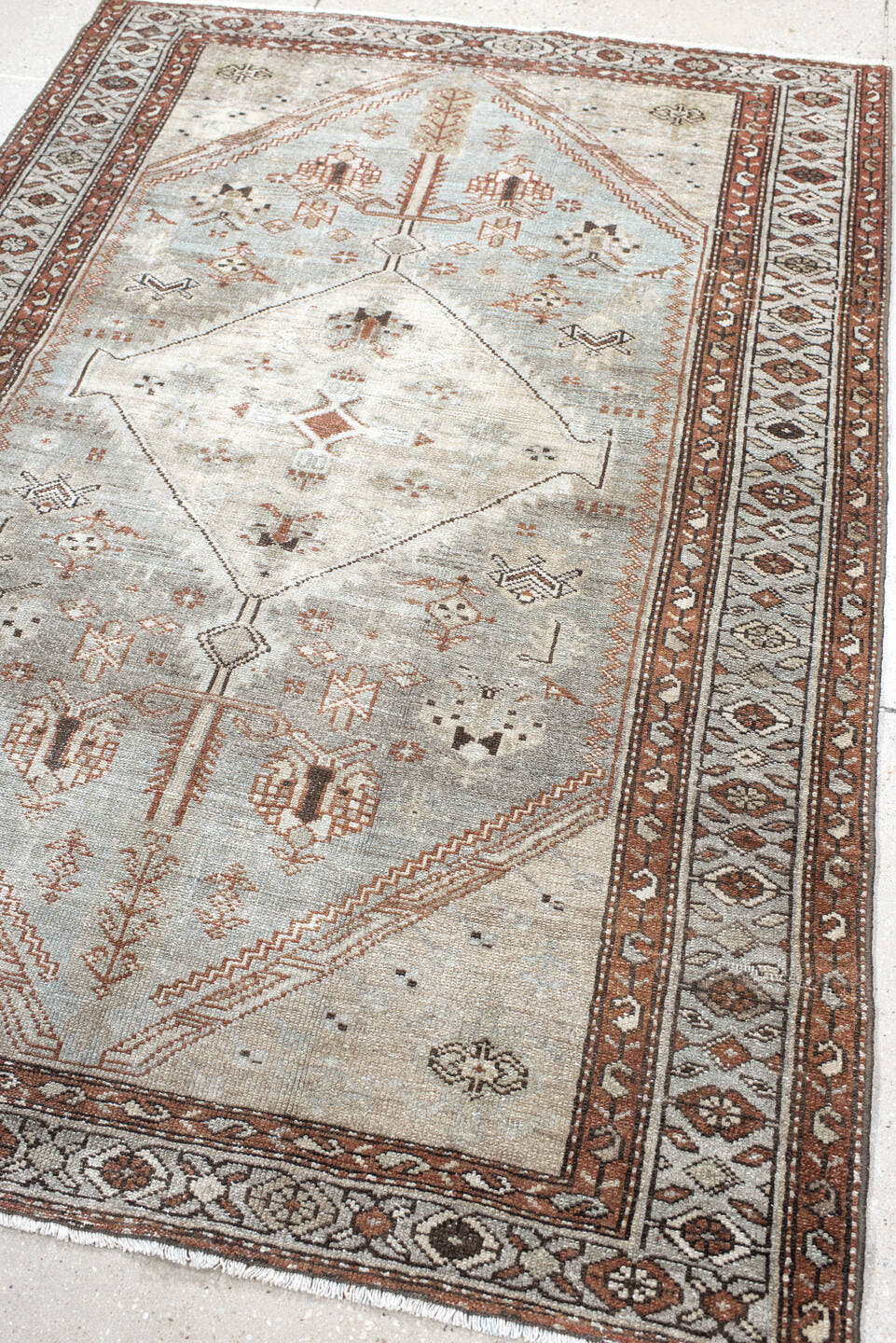 4' x 6' one-of-a-kind handmade antique Malayer small size rug. Color palette: ivory, pale blue, rust, charcoal, taupe, camel
