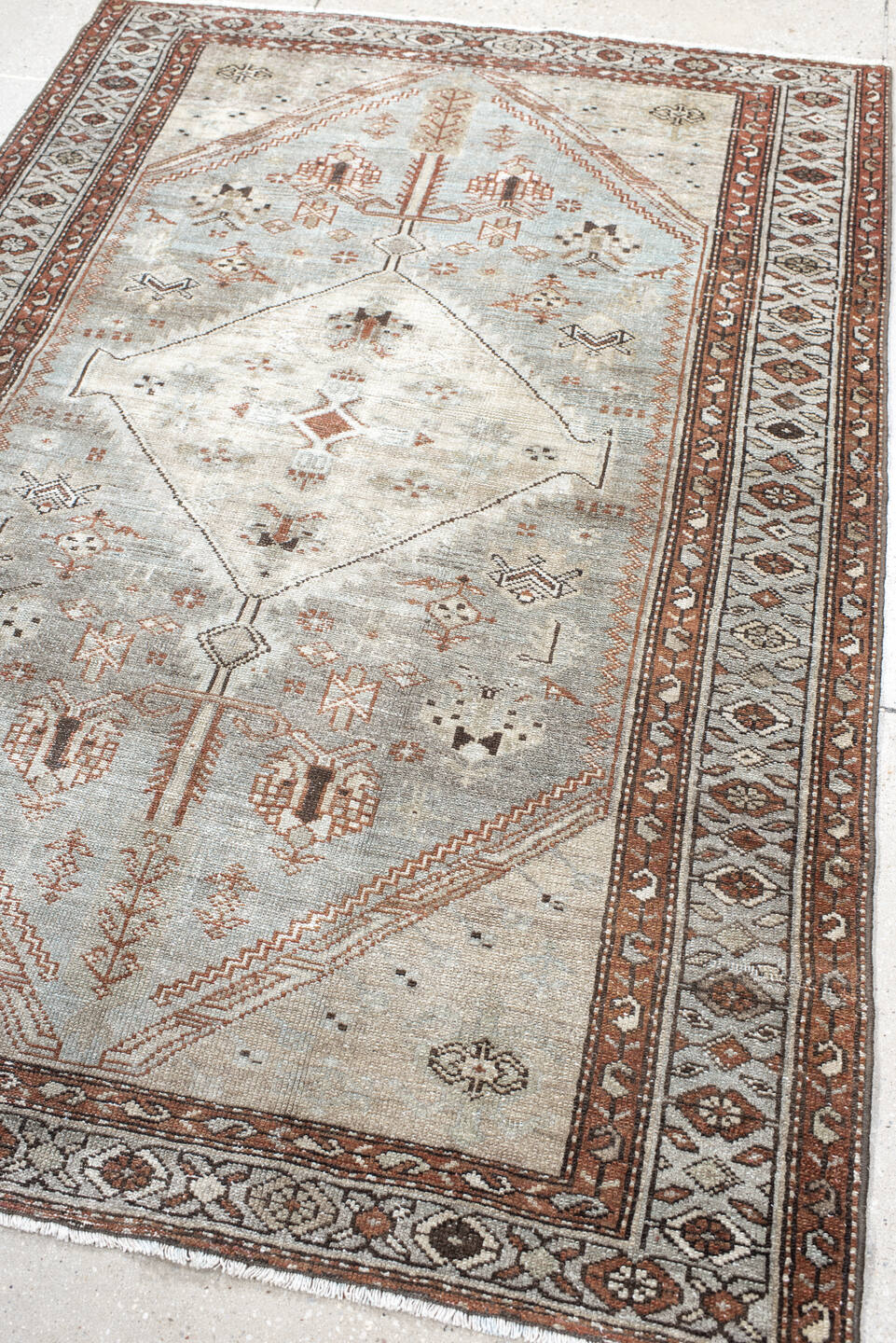4' x 6' one-of-a-kind handmade antique Malayer small size rug. Color palette: ivory, pale blue, rust, charcoal, taupe, camel