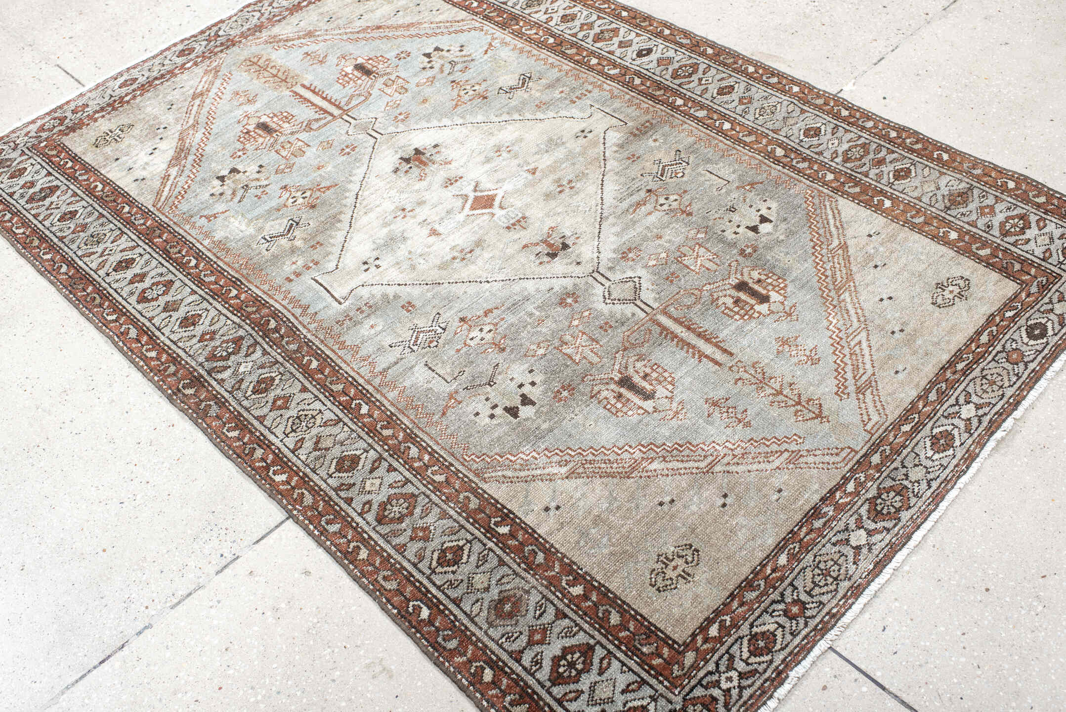 4' x 6' one-of-a-kind handmade antique Malayer small size rug. Color palette: ivory, pale blue, rust, charcoal, taupe, camel
