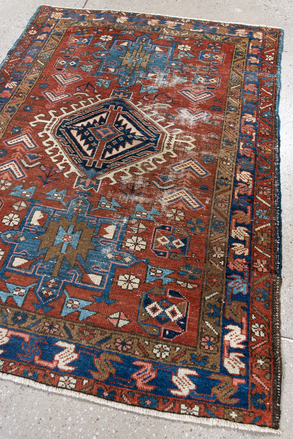 3' x 4' one-of-a-kind handmade antique Karaje small size rug. Color palette: rust, blue, ivory, camel, navy, pink, taupe
