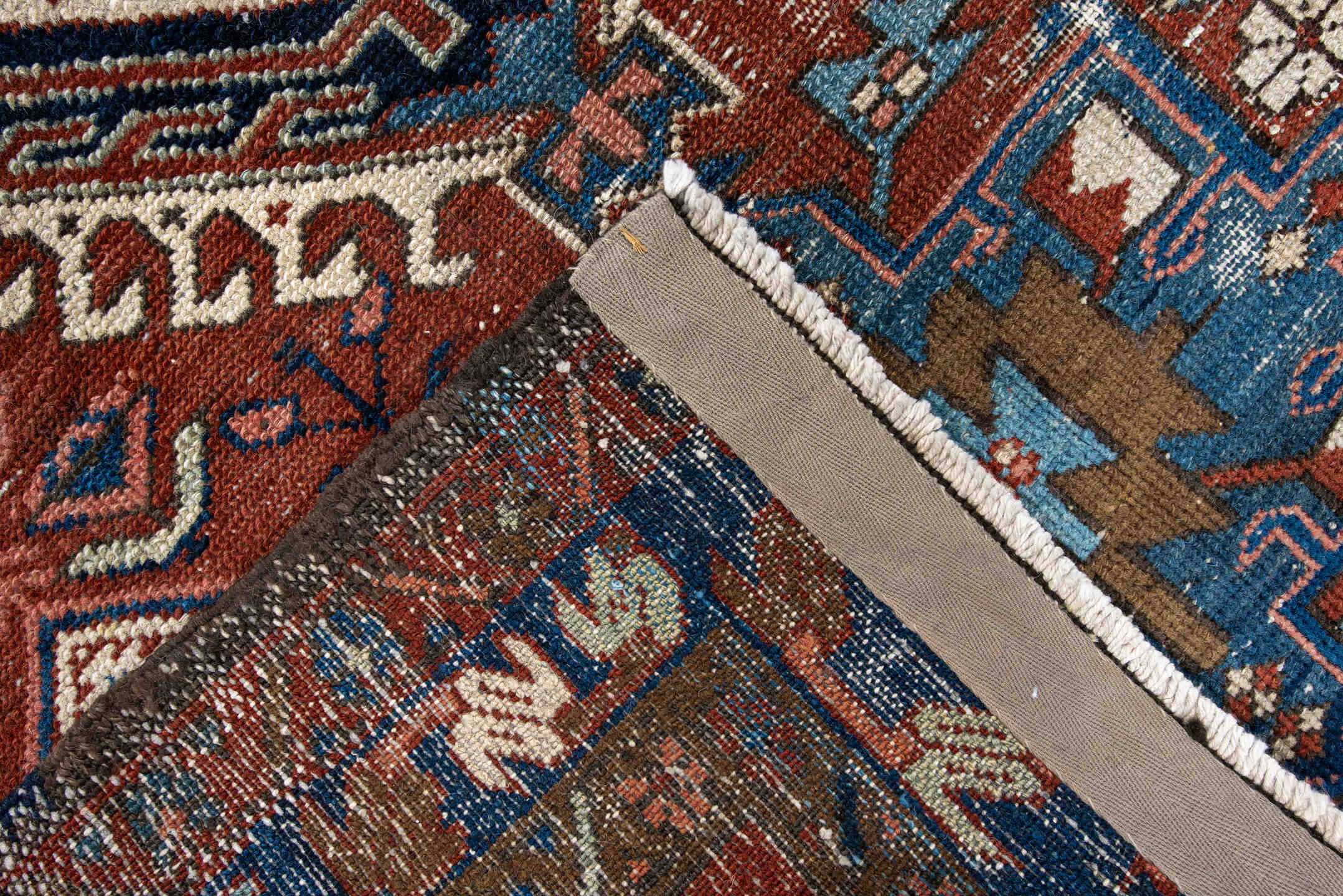 3' x 4' one-of-a-kind handmade antique Karaje small size rug. Color palette: rust, blue, ivory, camel, navy, pink, taupe