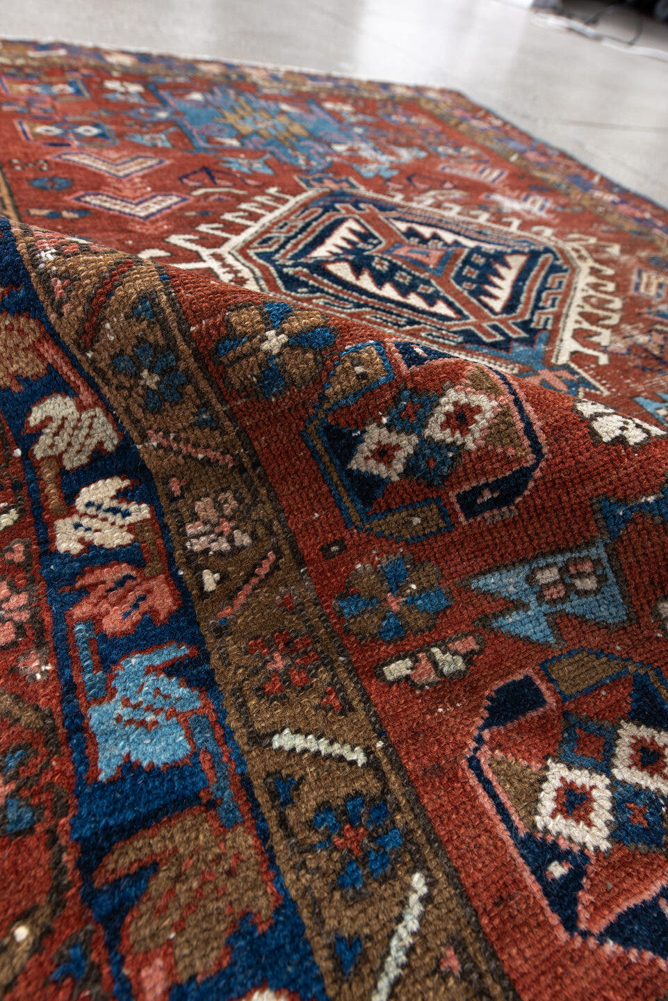 3' x 4' one-of-a-kind handmade antique Karaje small size rug. Color palette: rust, blue, ivory, camel, navy, pink, taupe