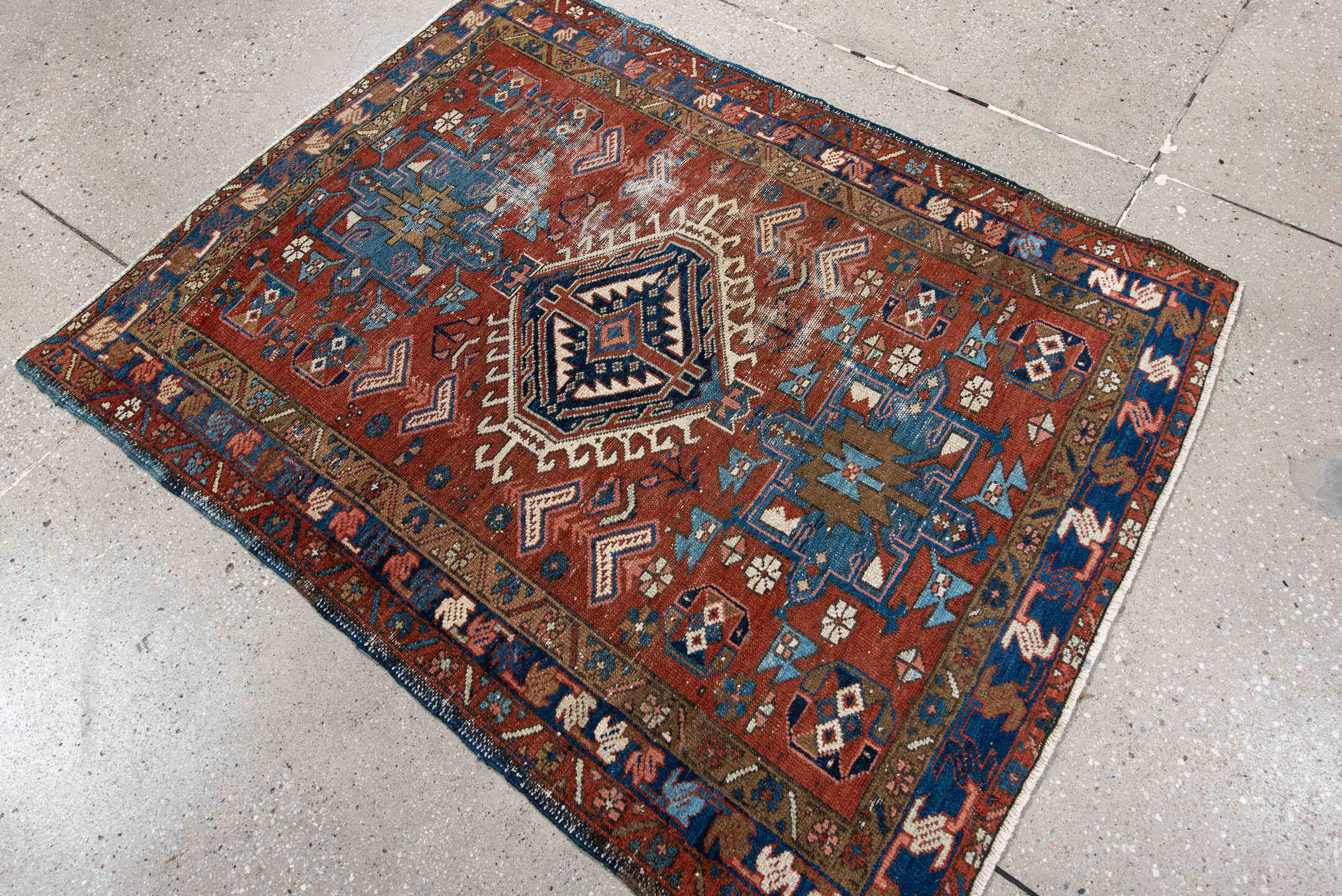 3' x 4' one-of-a-kind handmade antique Karaje small size rug. Color palette: rust, blue, ivory, camel, navy, pink, taupe