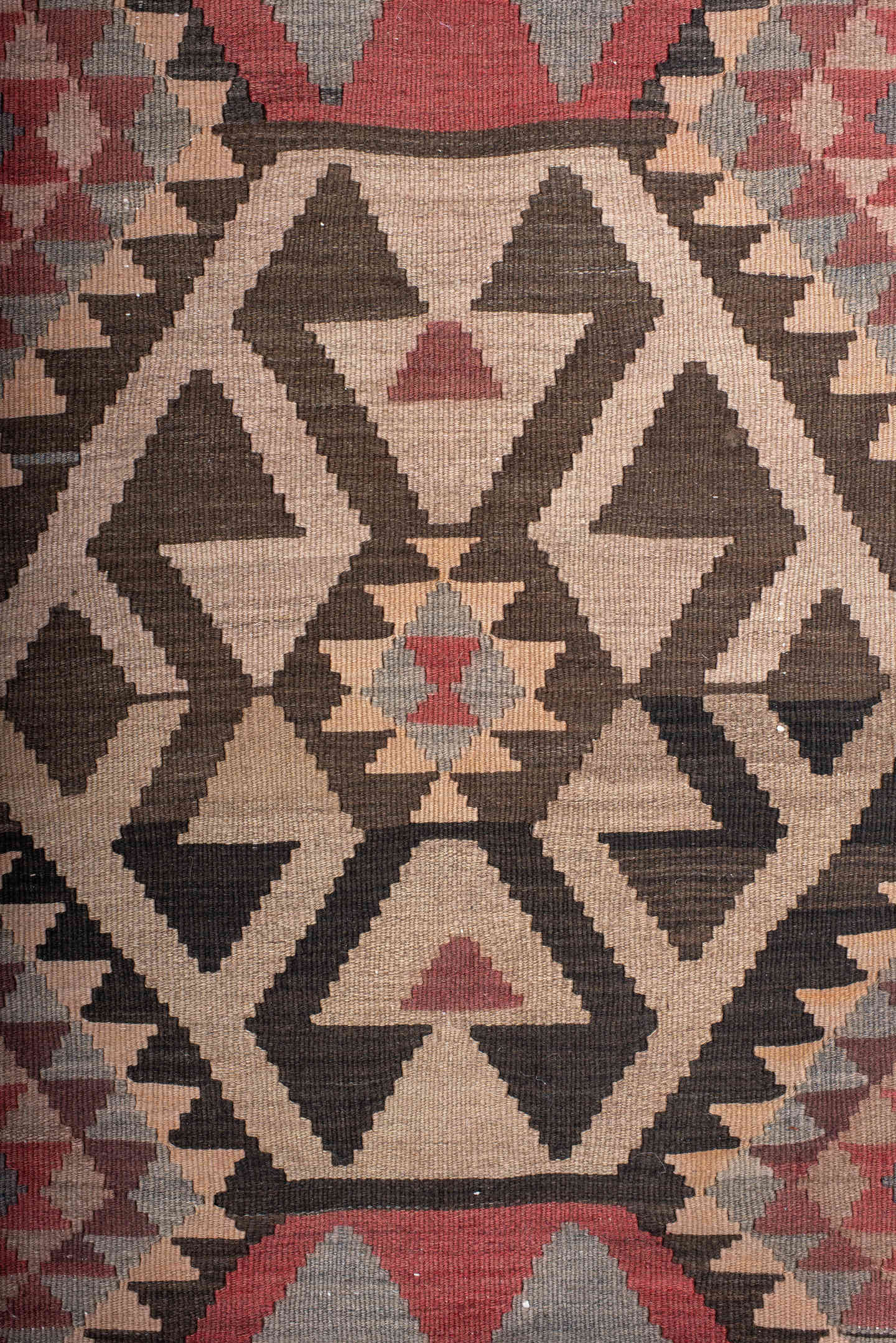 4' x 7' one-of-a-kind handmade antique Kilim rug. Color palette: brown, rust, ivory, slate, rose, charcoal, terracotta, gray