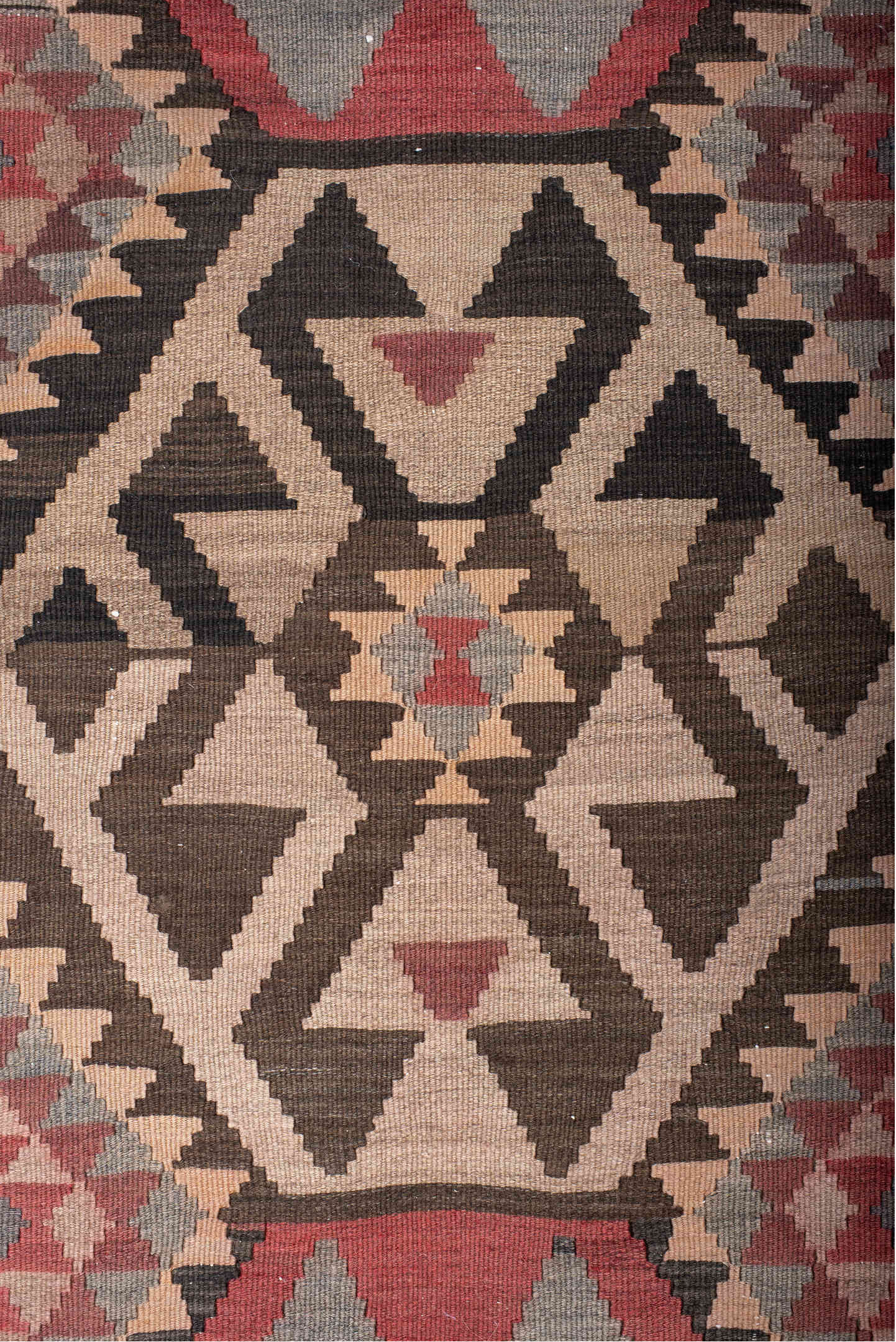4' x 7' one-of-a-kind handmade antique Kilim rug. Color palette: brown, rust, ivory, slate, rose, charcoal, terracotta, gray