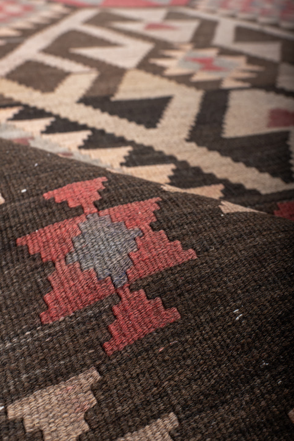 4' x 7' one-of-a-kind handmade antique Kilim rug. Color palette: brown, rust, ivory, slate, rose, charcoal, terracotta, gray