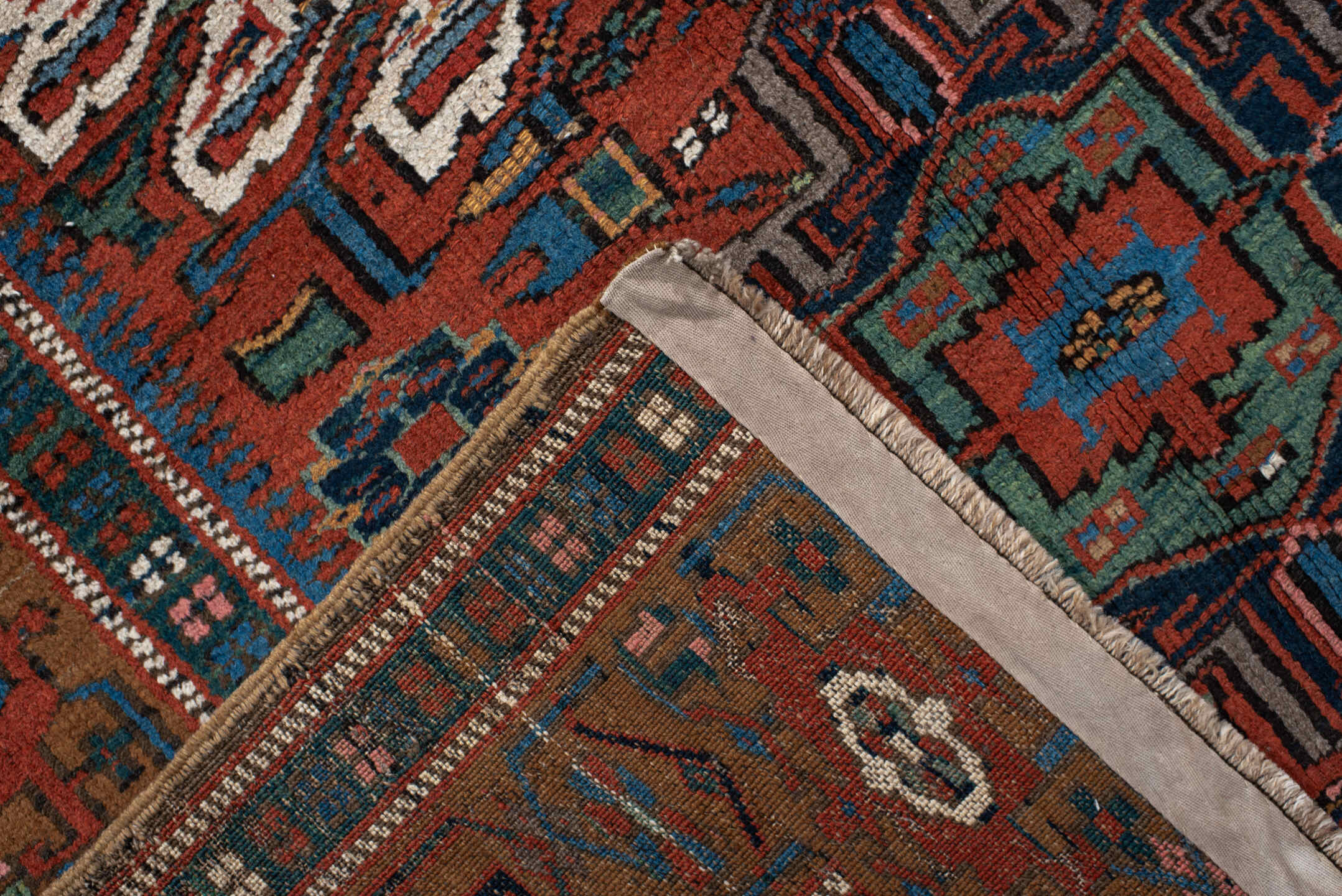 4' x 6' one-of-a-kind handmade vintage  rug. Color palette: rust, teal, camel, navy, ivory, rose, brown, terracotta, beige