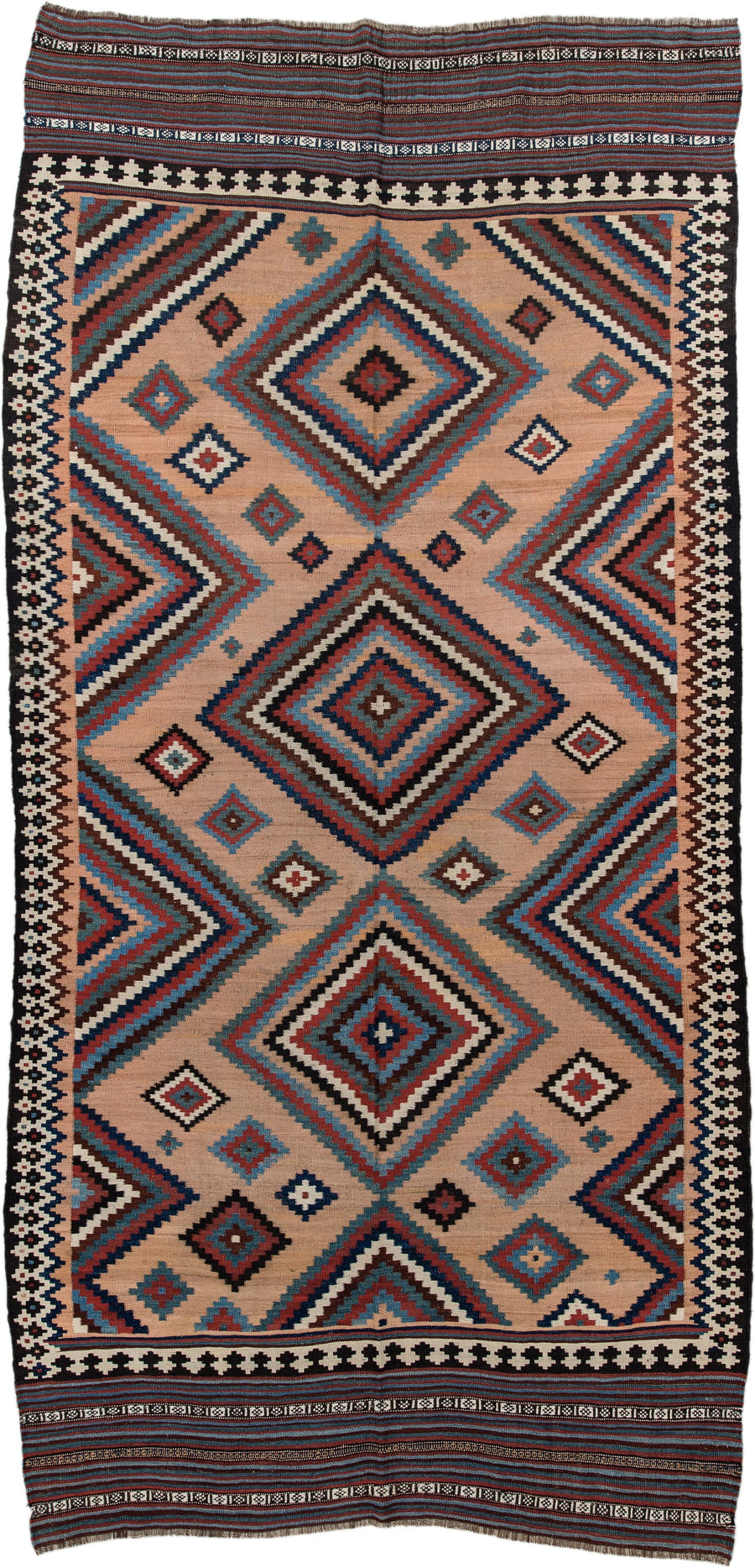5' x 10' one-of-a-kind handmade antique Kilim runner rug. Color palette: camel, indigo, ivory, rust, turquoise, charcoal