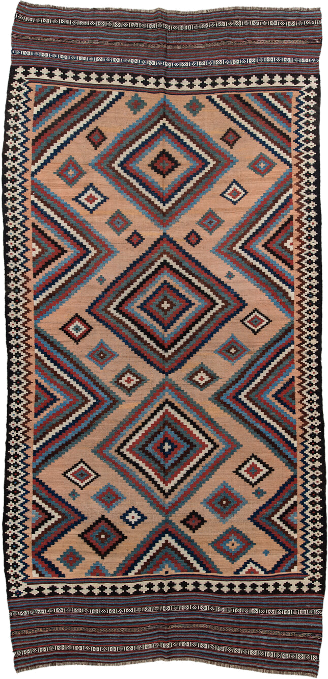 5' x 10' one-of-a-kind handmade antique Kilim runner rug. Color palette: camel, indigo, ivory, rust, turquoise, charcoal