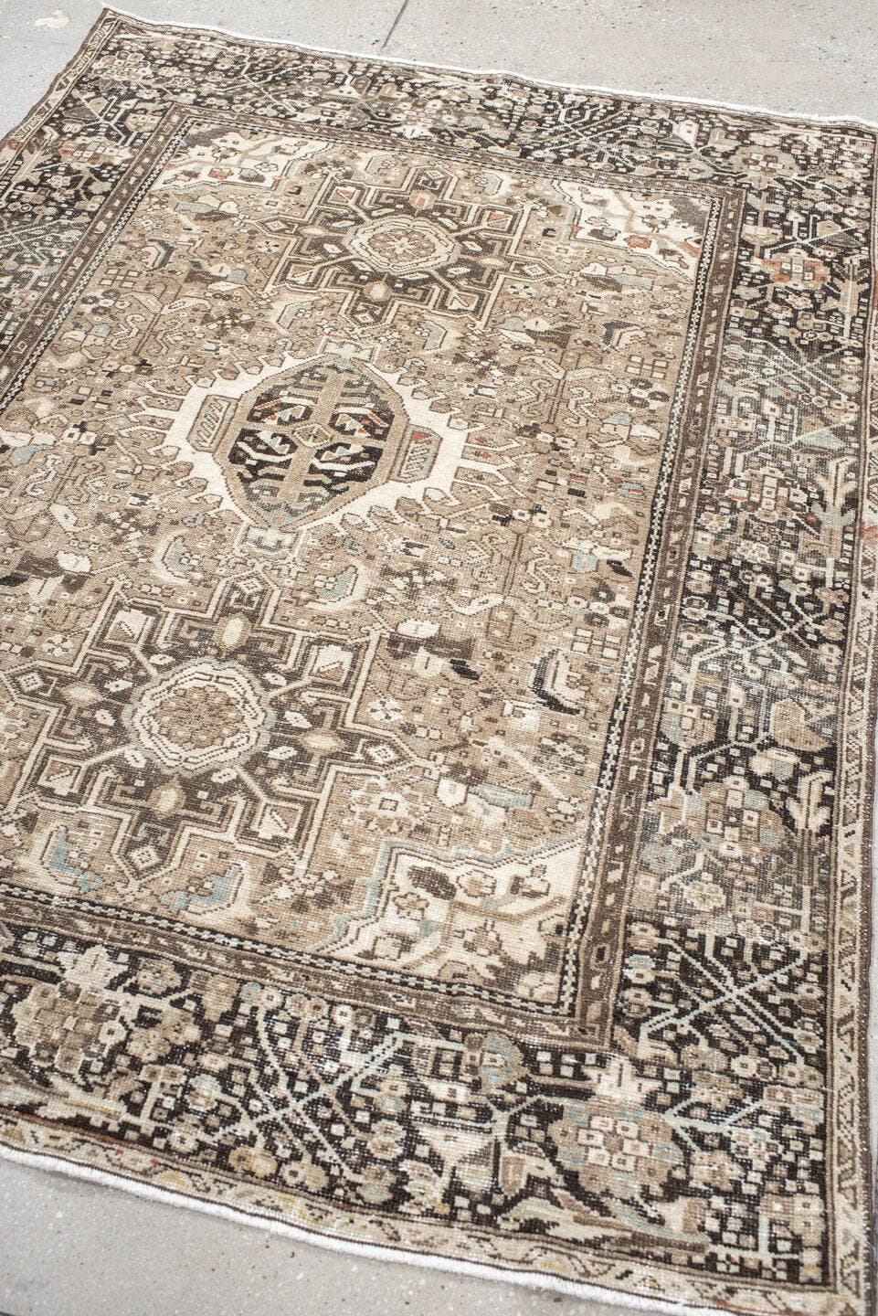 4' x 6' one-of-a-kind handmade antique Karaje small size rug. Color palette: taupe, ivory, brown, charcoal, camel, pale_blue