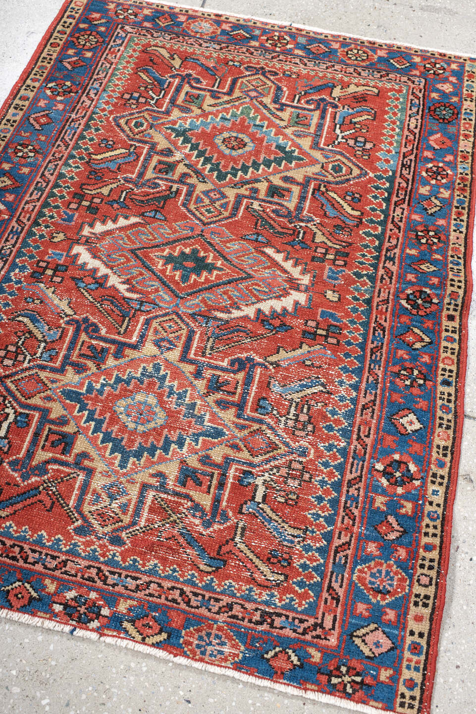 3' x 4' one-of-a-kind handmade antique Karaje small size rug. Color palette: rust, blue, ivory, navy, coral, teal, charcoal