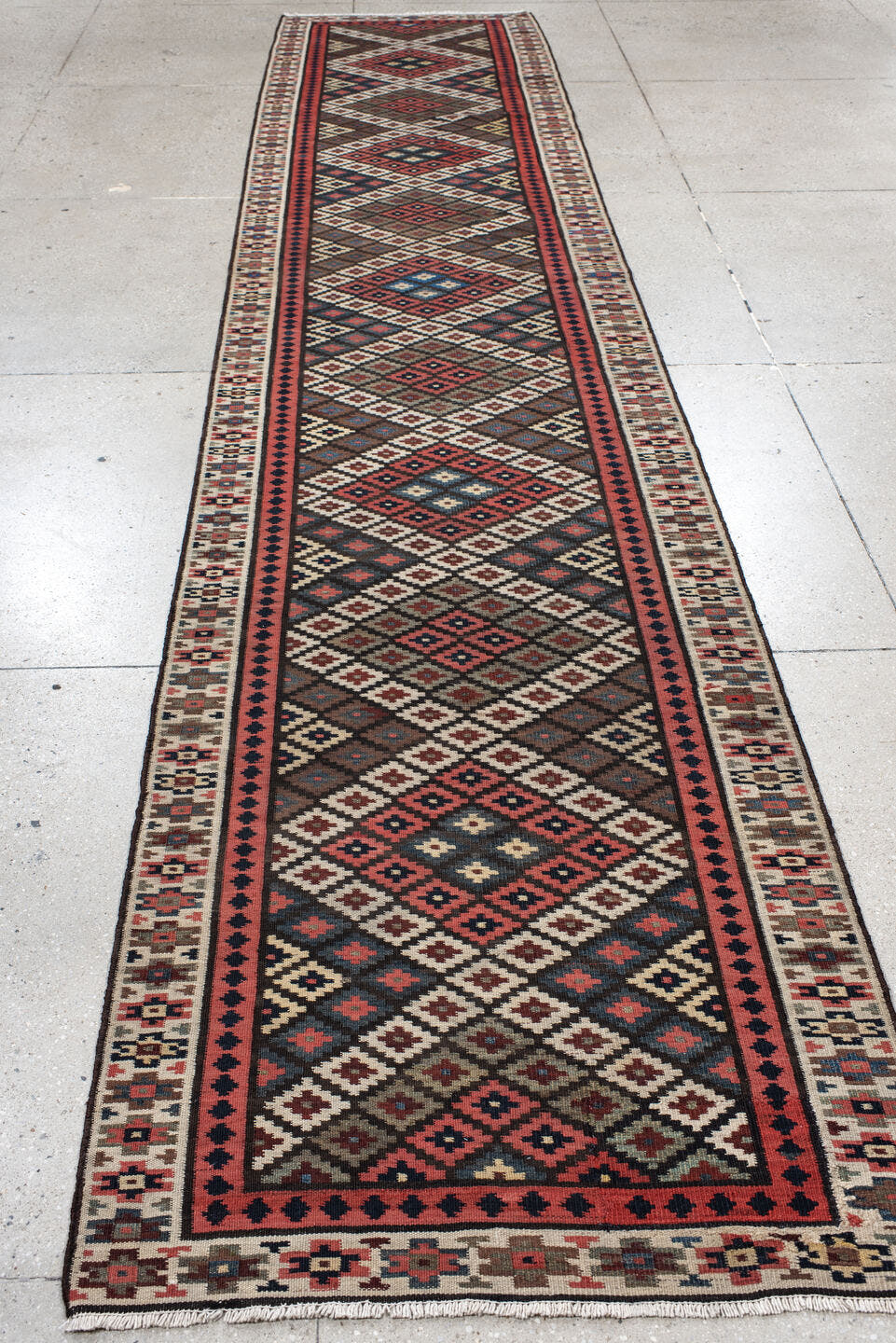 3' x 15' one-of-a-kind handmade antique Kilim runner rug. Color palette: rust, ivory, navy, brown, camel, crimson, sky_blue