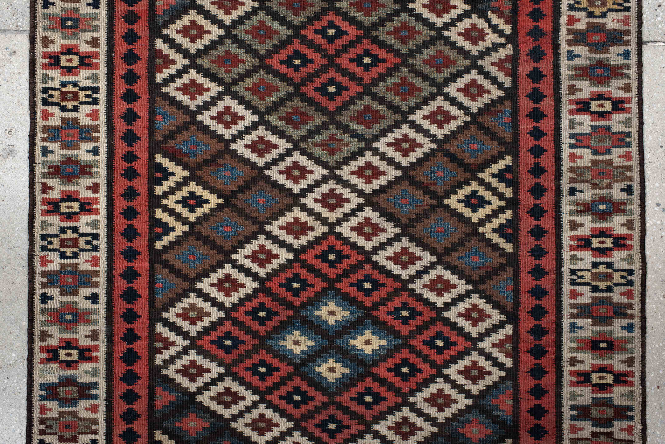3' x 15' one-of-a-kind handmade antique Kilim runner rug. Color palette: rust, ivory, navy, brown, camel, crimson, sky_blue