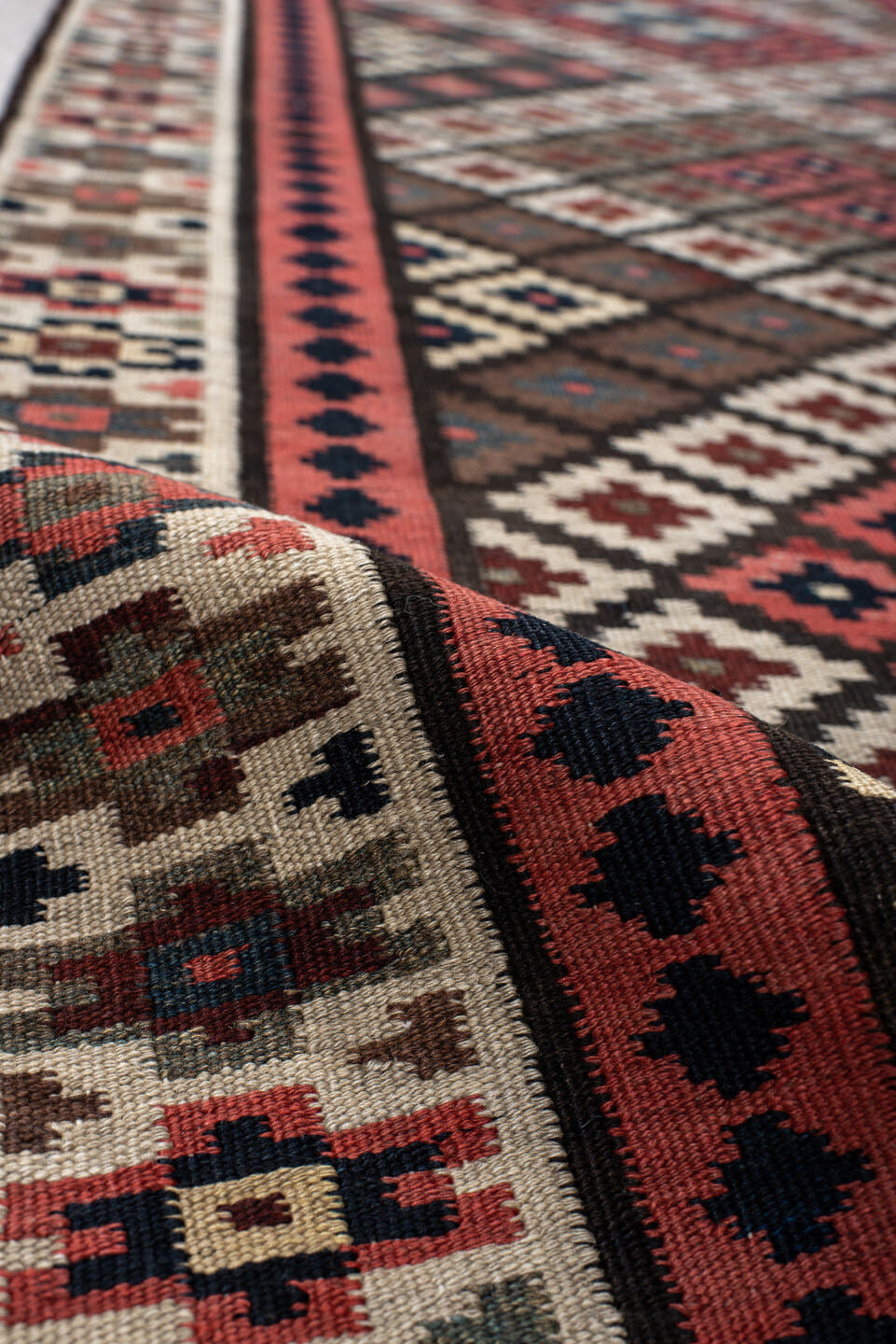 3' x 15' one-of-a-kind handmade antique Kilim runner rug. Color palette: rust, ivory, navy, brown, camel, crimson, sky_blue