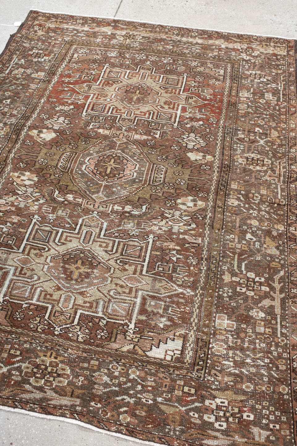 4' x 5' one-of-a-kind handmade antique Karaje small size rug. Color palette: brown, terra cotta, ivory, taupe, camel, rust