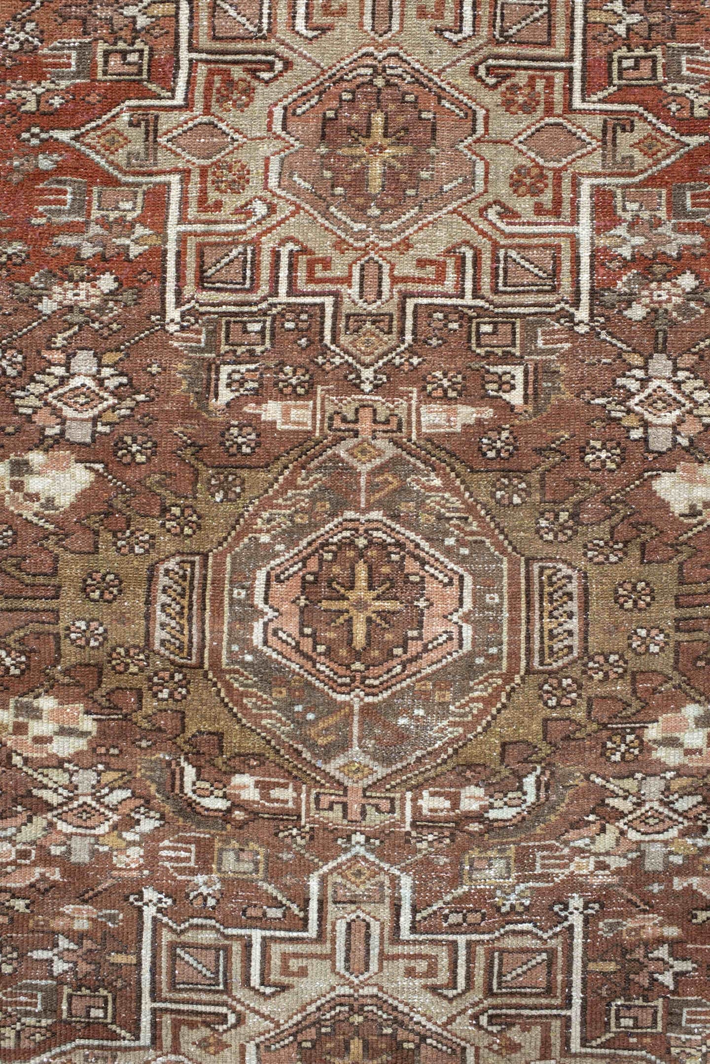 4' x 5' one-of-a-kind handmade antique Karaje small size rug. Color palette: brown, terra cotta, ivory, taupe, camel, rust