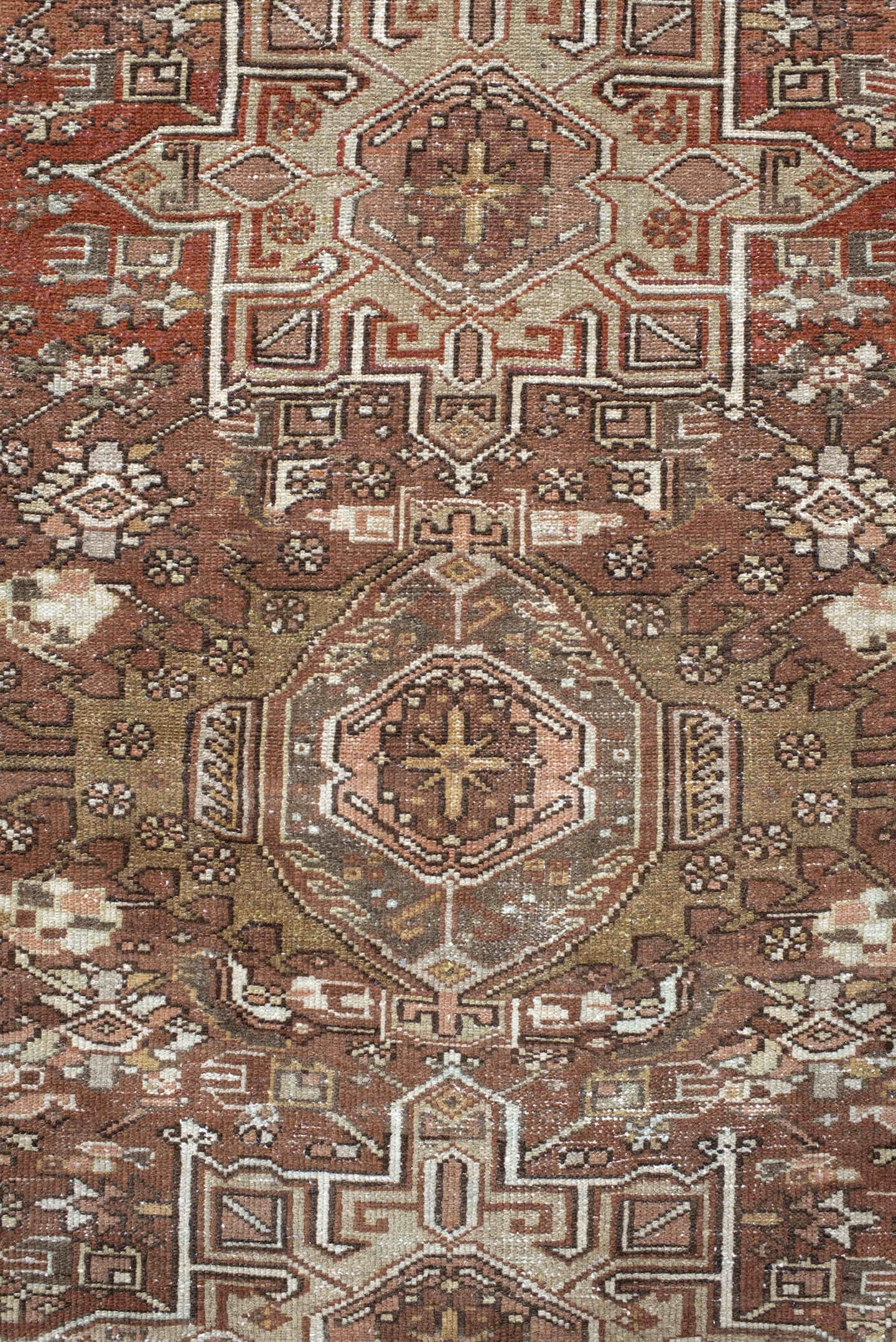 4' x 5' one-of-a-kind handmade antique Karaje small size rug. Color palette: brown, terra cotta, ivory, taupe, camel, rust