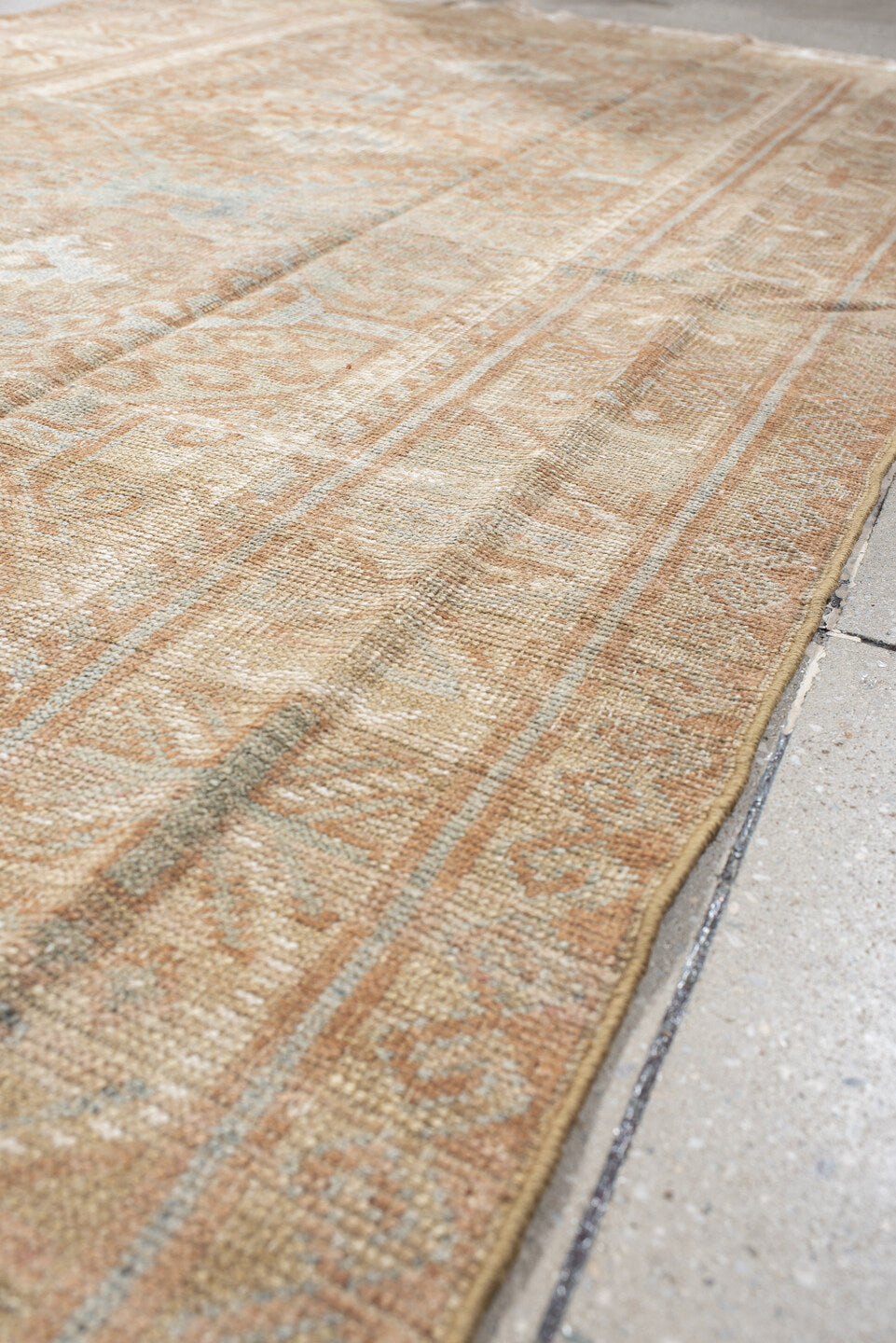 4' x 7' one-of-a-kind handmade vintage Belouch rug. Color palette: camel, taupe, ivory, pale aqua, blush, sand, light gray