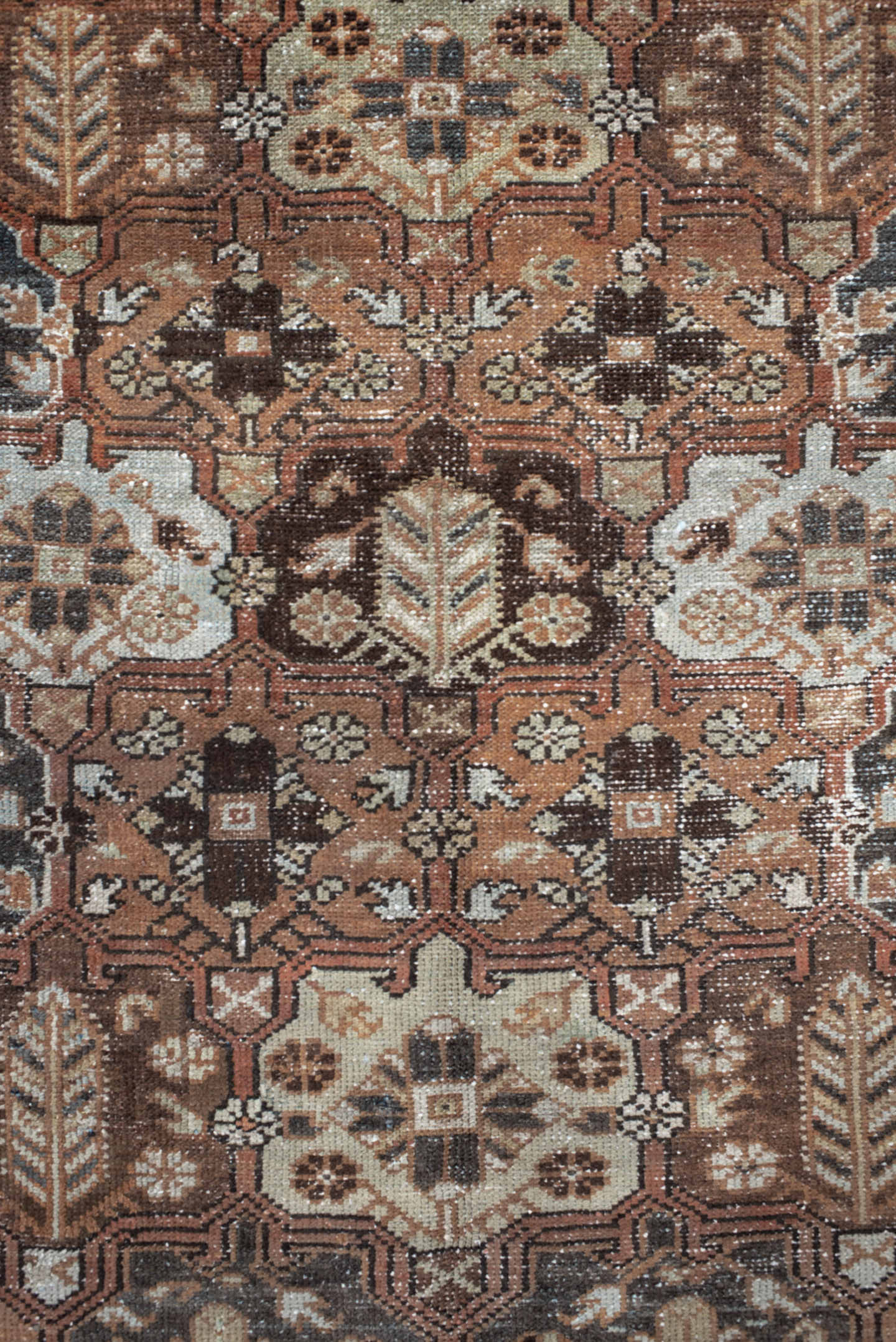 4' x 7' one-of-a-kind handmade vintage Baktiary rug. Color palette: rust, ivory, charcoal, soft blue, brown, camel, burgundy