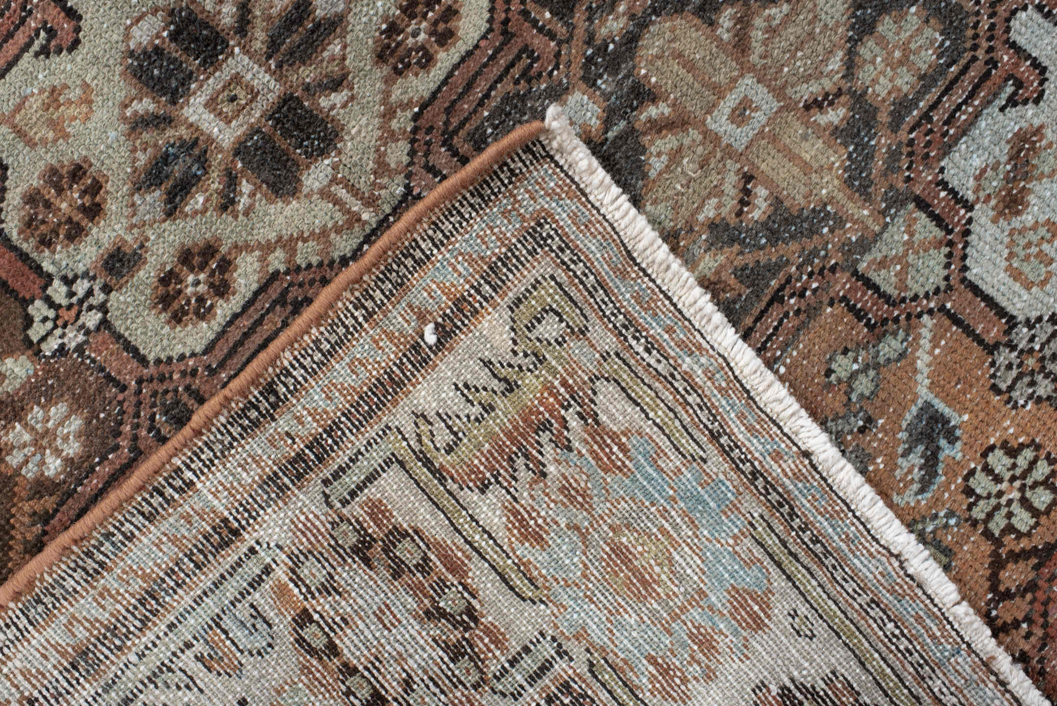 4' x 7' one-of-a-kind handmade vintage Baktiary rug. Color palette: rust, ivory, charcoal, soft blue, brown, camel, burgundy