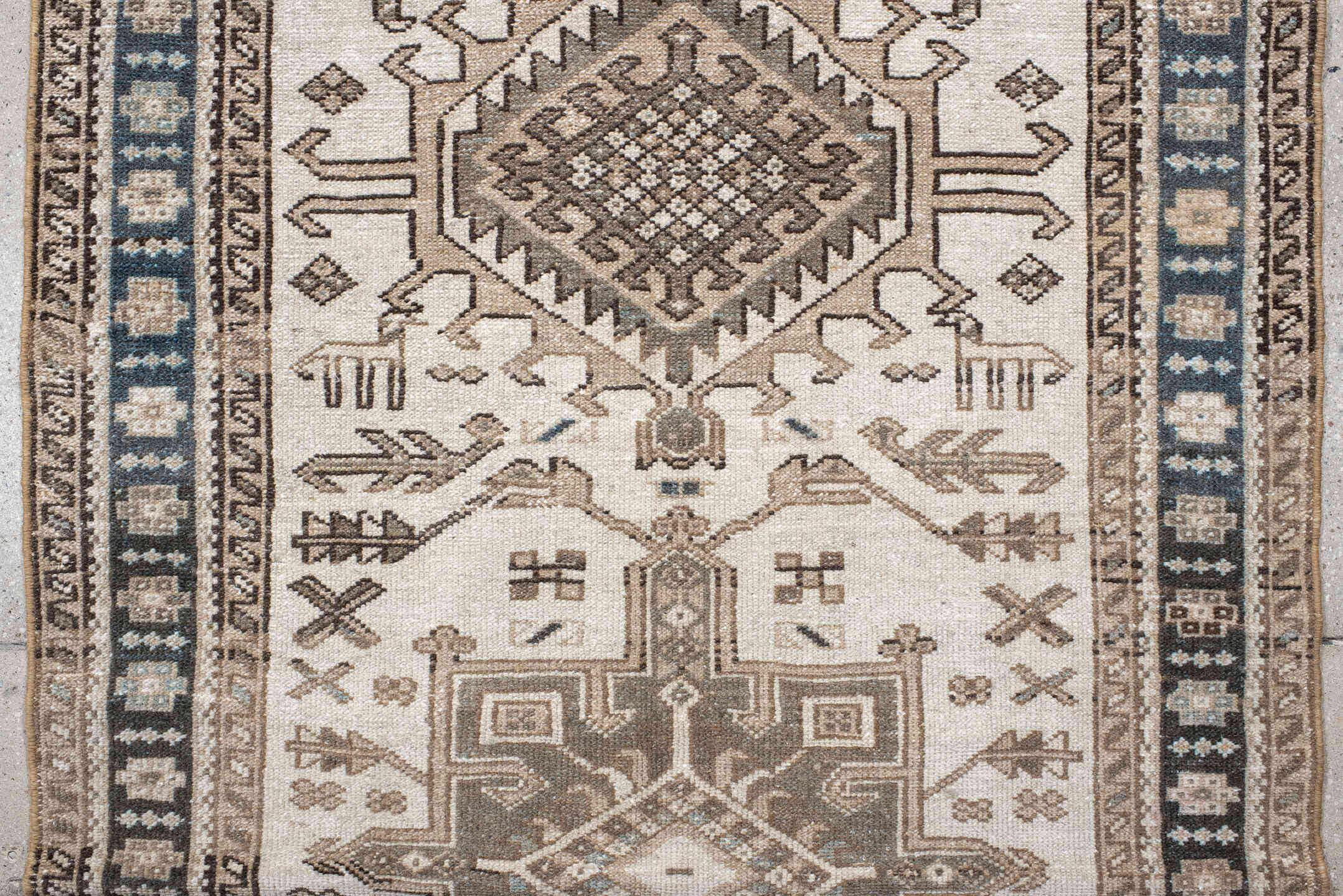 3' x 6' one-of-a-kind handmade vintage Karaje runner rug. Color palette: ivory, taupe, navy, brown, camel, charcoal, beige