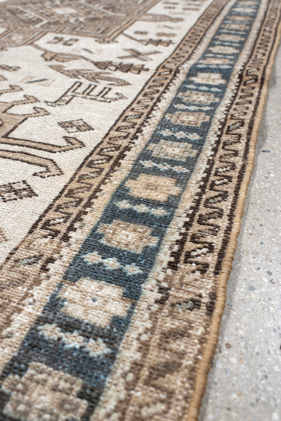 3' x 6' one-of-a-kind handmade vintage Karaje runner rug. Color palette: ivory, taupe, navy, brown, camel, charcoal, beige