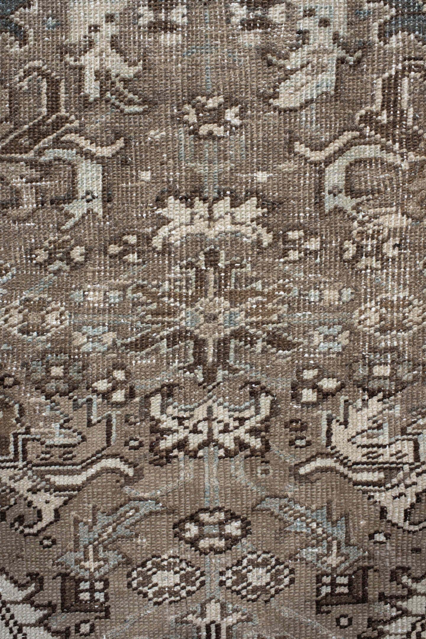 7' x 7' one-of-a-kind handmade antique Heriz rug. Color palette: taupe, ivory, charcoal, brown, slate, pale blue, beige