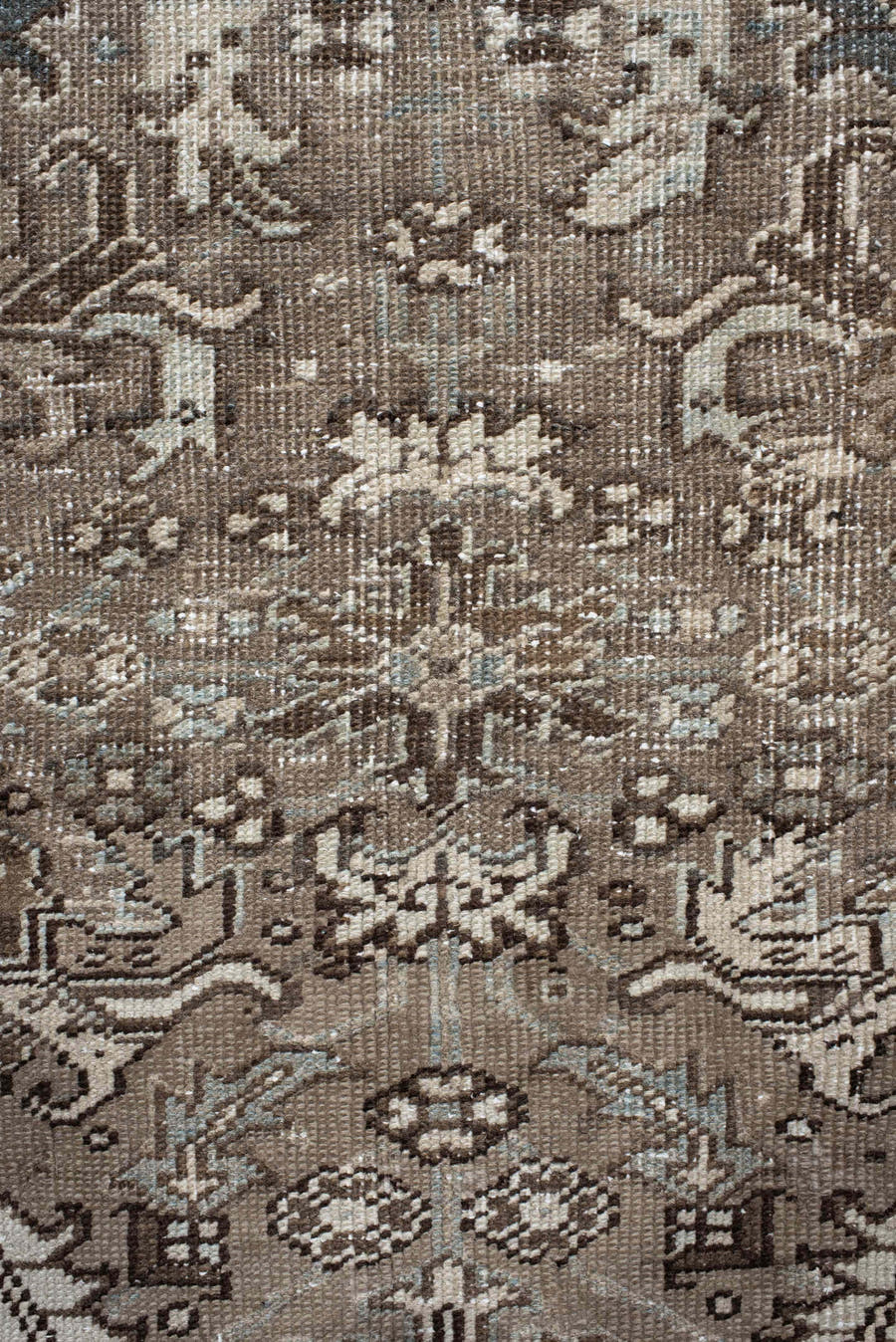 7' x 7' one-of-a-kind handmade antique Heriz rug. Color palette: taupe, ivory, charcoal, brown, slate, pale blue, beige