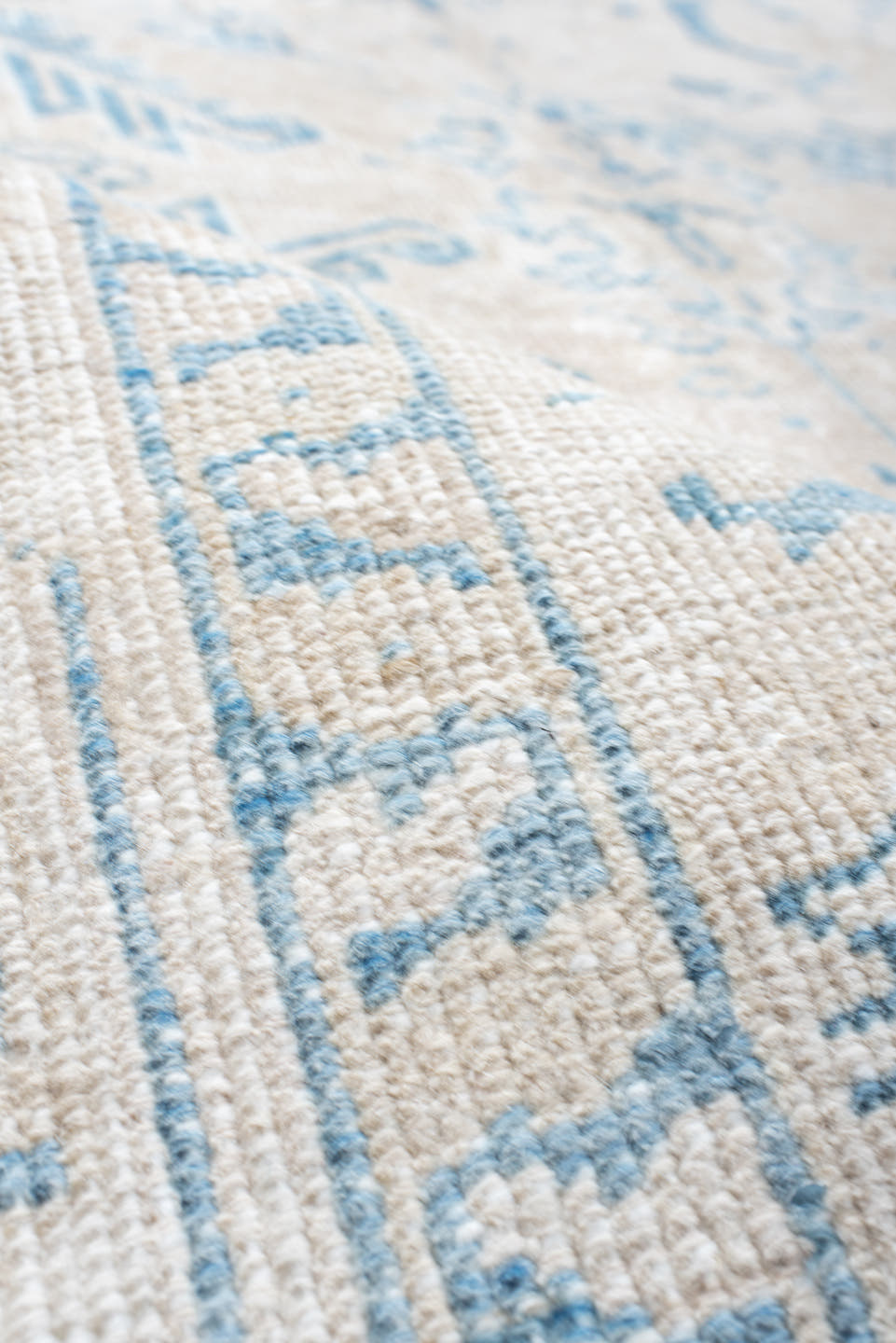 5' x 8' one-of-a-kind handmade antique Heriz medium size rug. Color palette: ivory, sky blue, ice blue, cream, beige