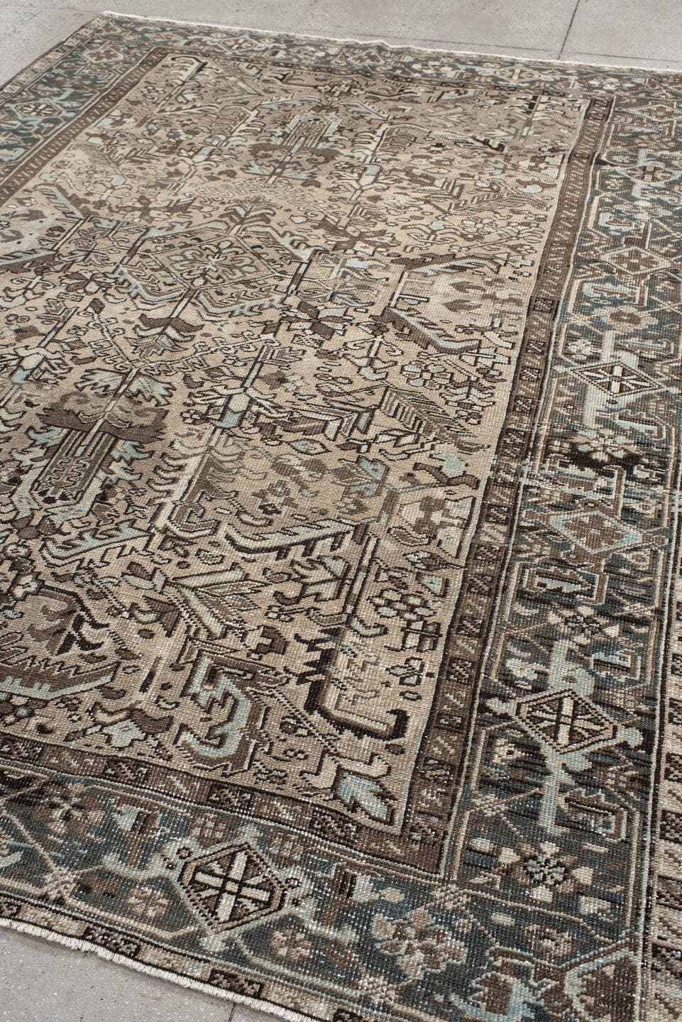 6' x 8' one-of-a-kind handmade antique  medium size rug. Color palette: ivory, taupe, slate, charcoal, brown, sky blue