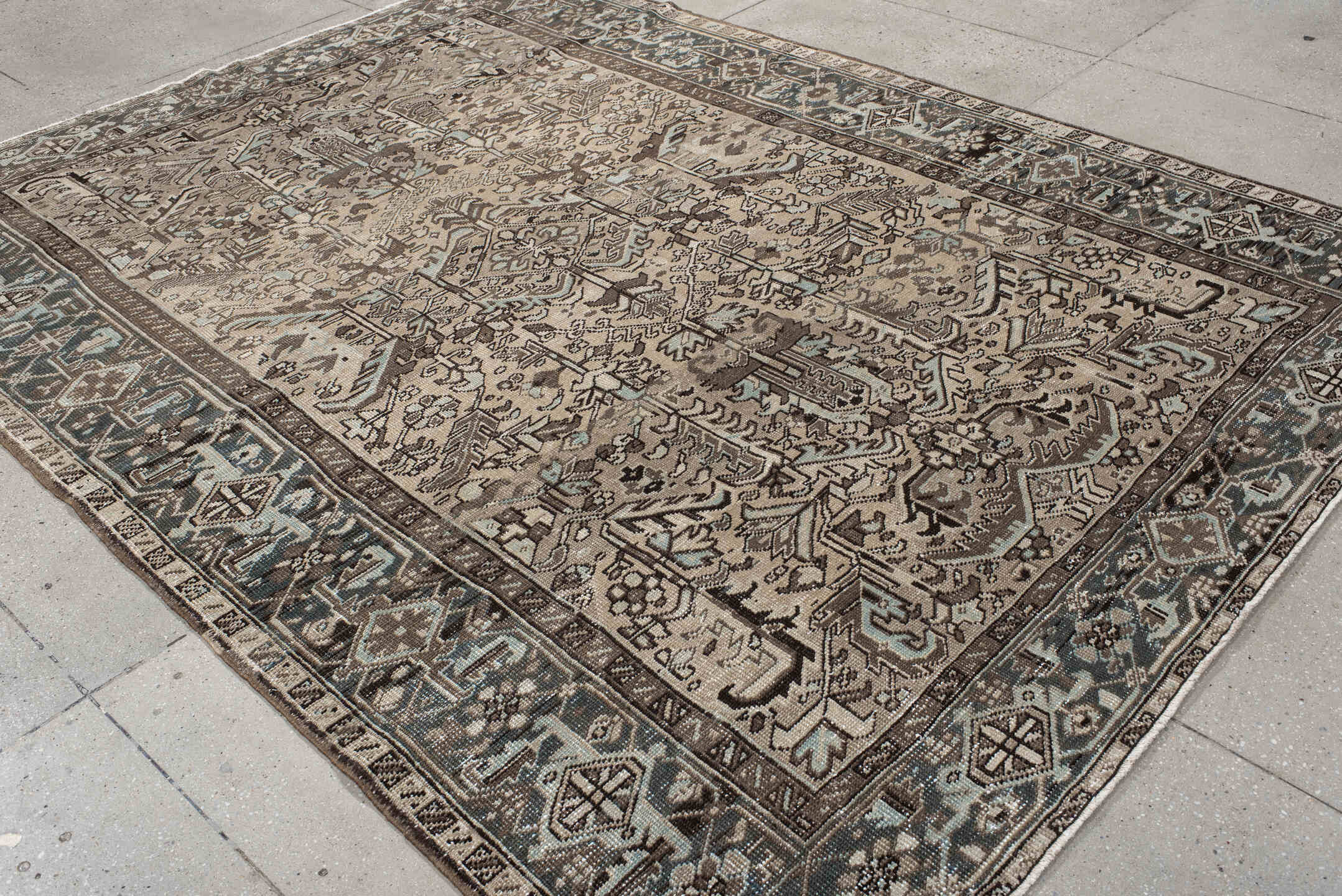6' x 8' one-of-a-kind handmade antique  medium size rug. Color palette: ivory, taupe, slate, charcoal, brown, sky blue