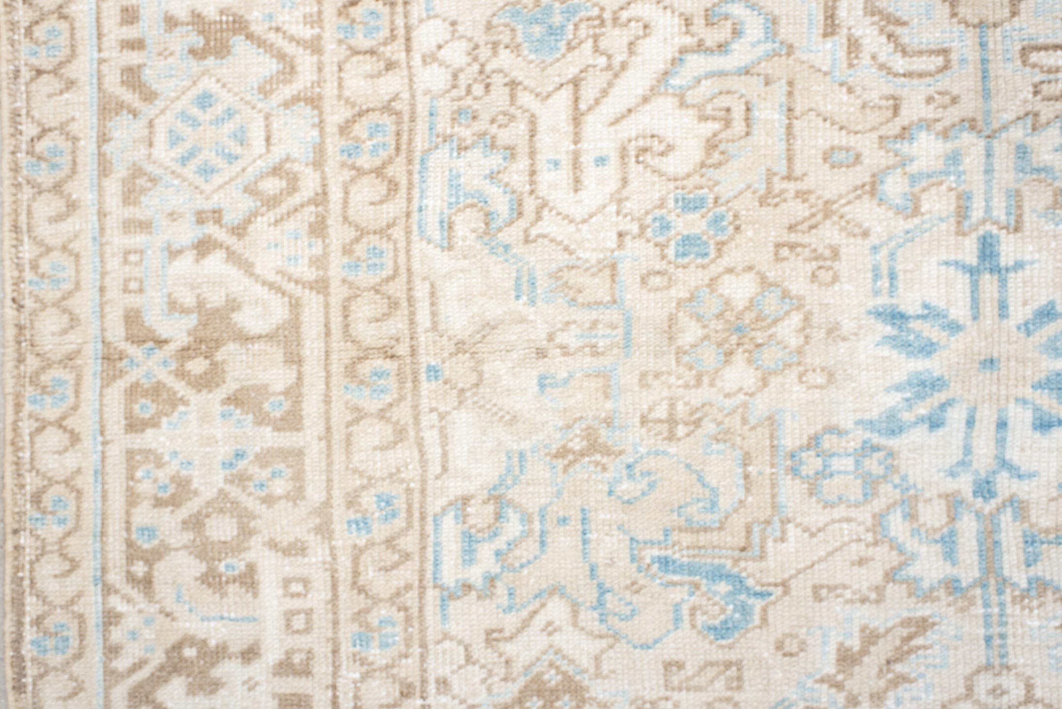 5' x 8' one-of-a-kind handmade vintage Heriz medium size rug. Color palette: ivory, taupe, sky blue, beige, gray, light blue