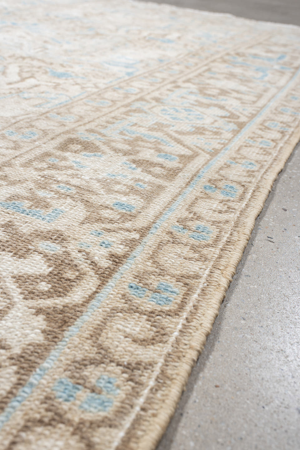 5' x 8' one-of-a-kind handmade vintage Heriz medium size rug. Color palette: ivory, taupe, sky blue, beige, gray, light blue