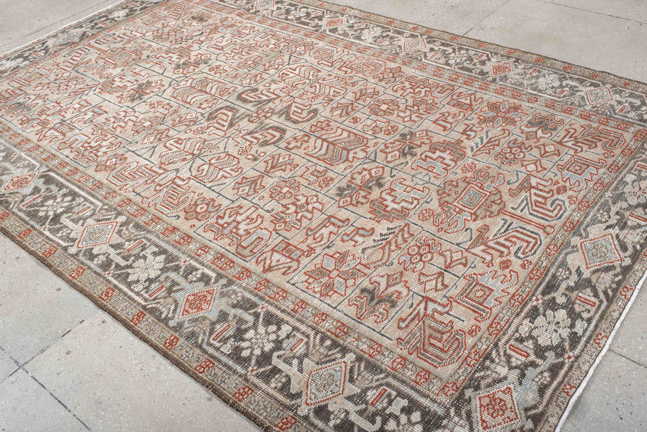 6' x 9' one-of-a-kind handmade vintage Heriz medium size rug. Color palette: gray, off-white, red, brown, pink, light gray