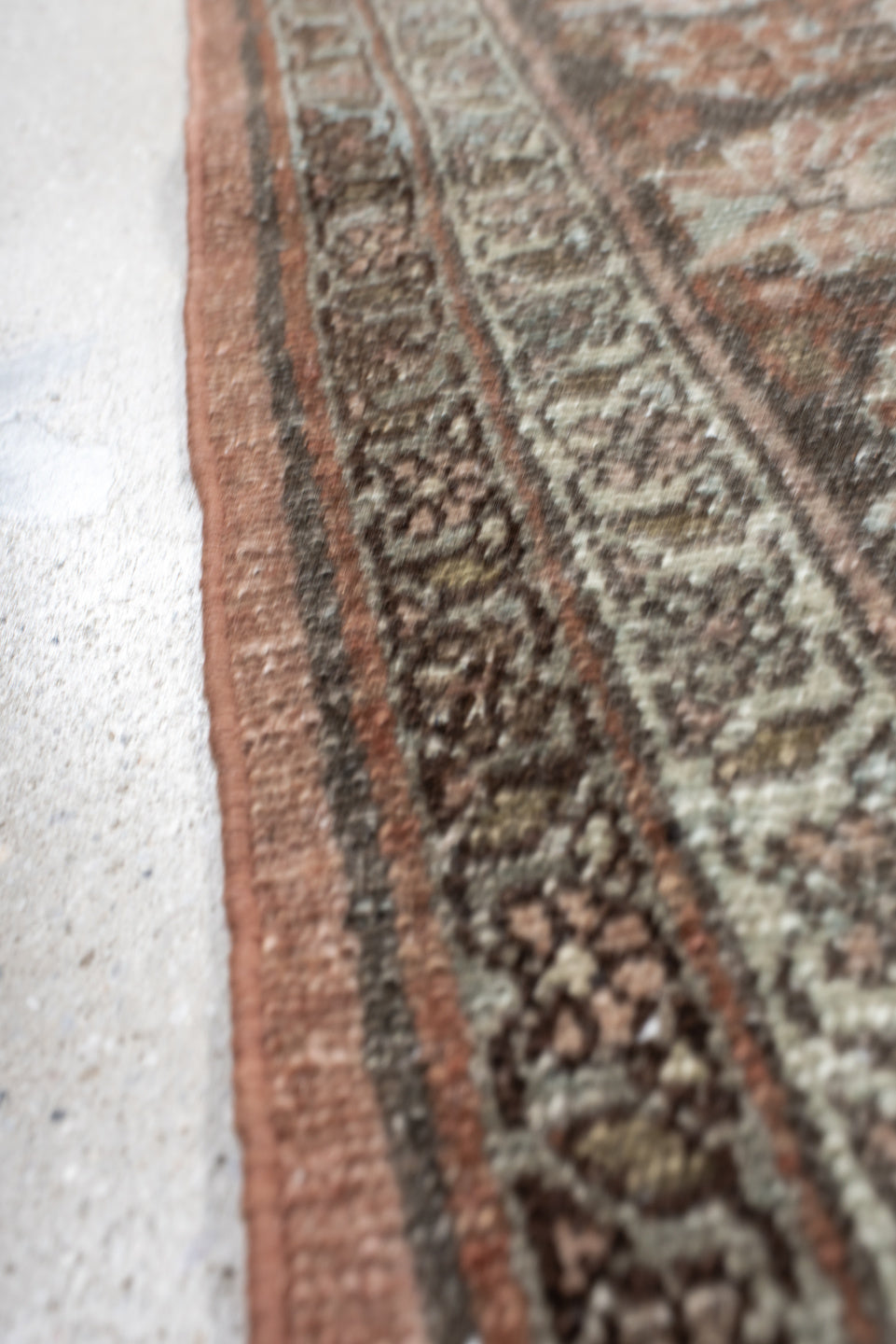 7' x 9' one-of-a-kind handmade antique Lilian rug. Color palette: rose, charcoal, dusty pink, ivory, taupe, rust, slate
