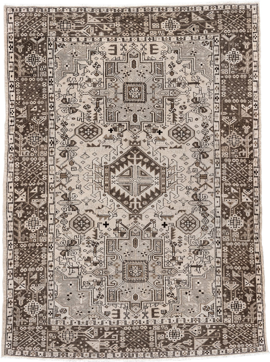 5' x 6' one-of-a-kind handmade antique Karaje rug. Color palette: ivory, brown, taupe, camel, charcoal, beige, gray, black