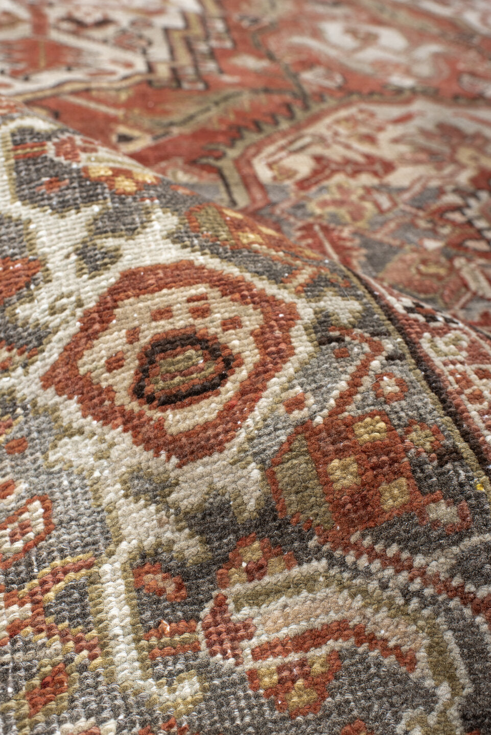 3' x 6' one-of-a-kind handmade vintage Heriz small size rug. Color palette: terra cotta, ivory, sage, taupe, charcoal, rust
