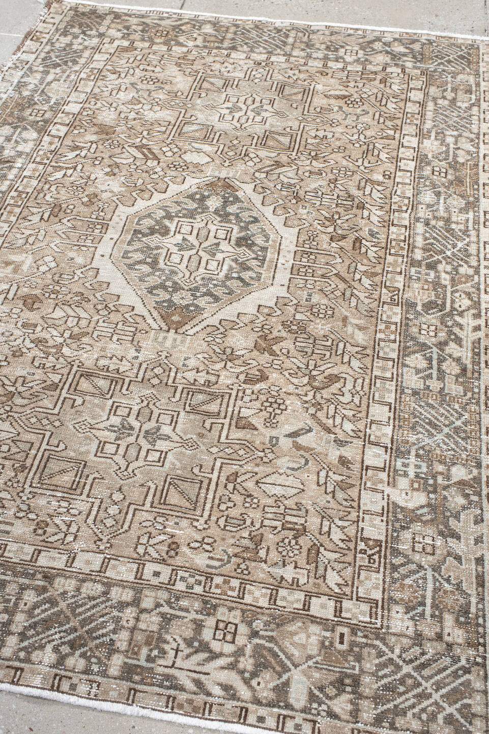 4' x 6' one-of-a-kind handmade vintage Karaje small size rug. Color palette: ivory, taupe, brown, camel, charcoal, beige