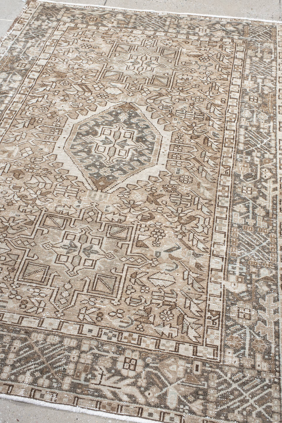 4' x 6' one-of-a-kind handmade vintage Karaje small size rug. Color palette: ivory, taupe, brown, camel, charcoal, beige