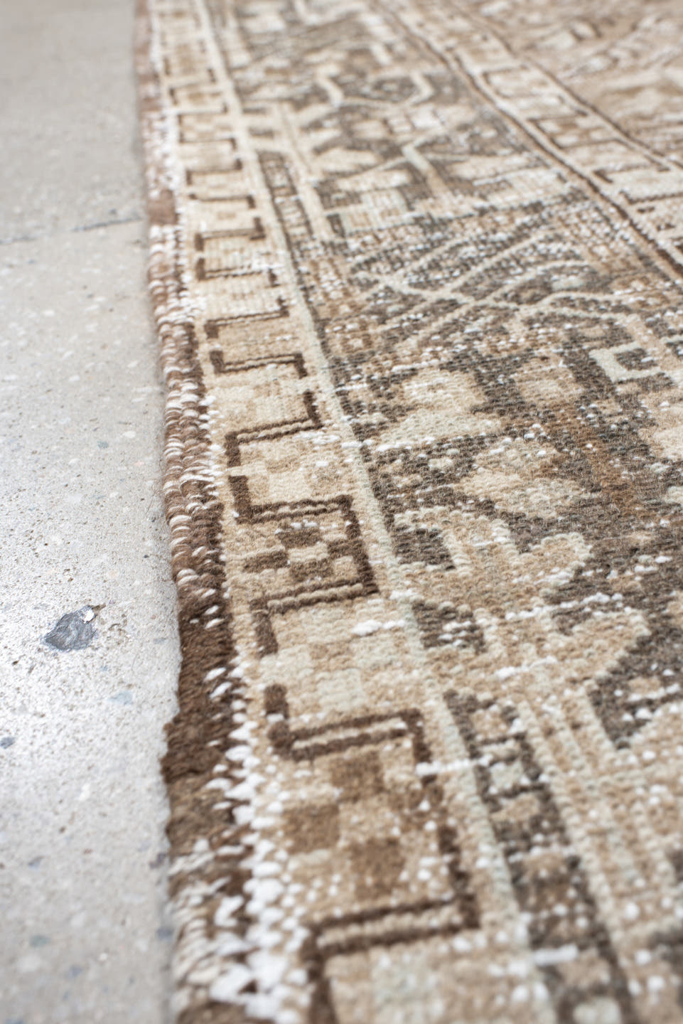 4' x 6' one-of-a-kind handmade vintage Karaje small size rug. Color palette: ivory, taupe, brown, camel, charcoal, beige