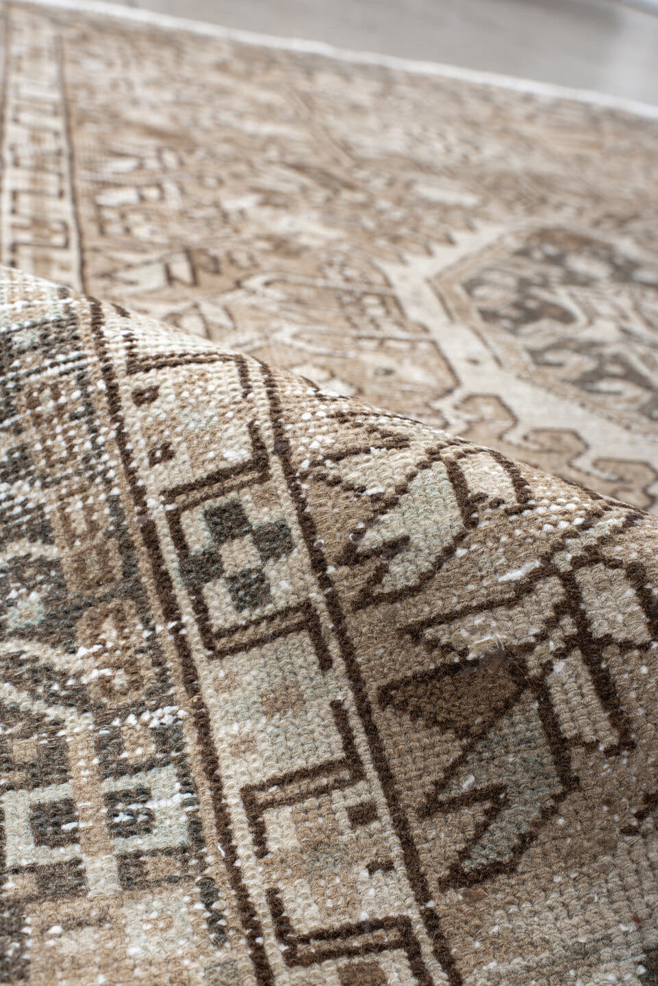 4' x 6' one-of-a-kind handmade vintage Karaje small size rug. Color palette: ivory, taupe, brown, camel, charcoal, beige