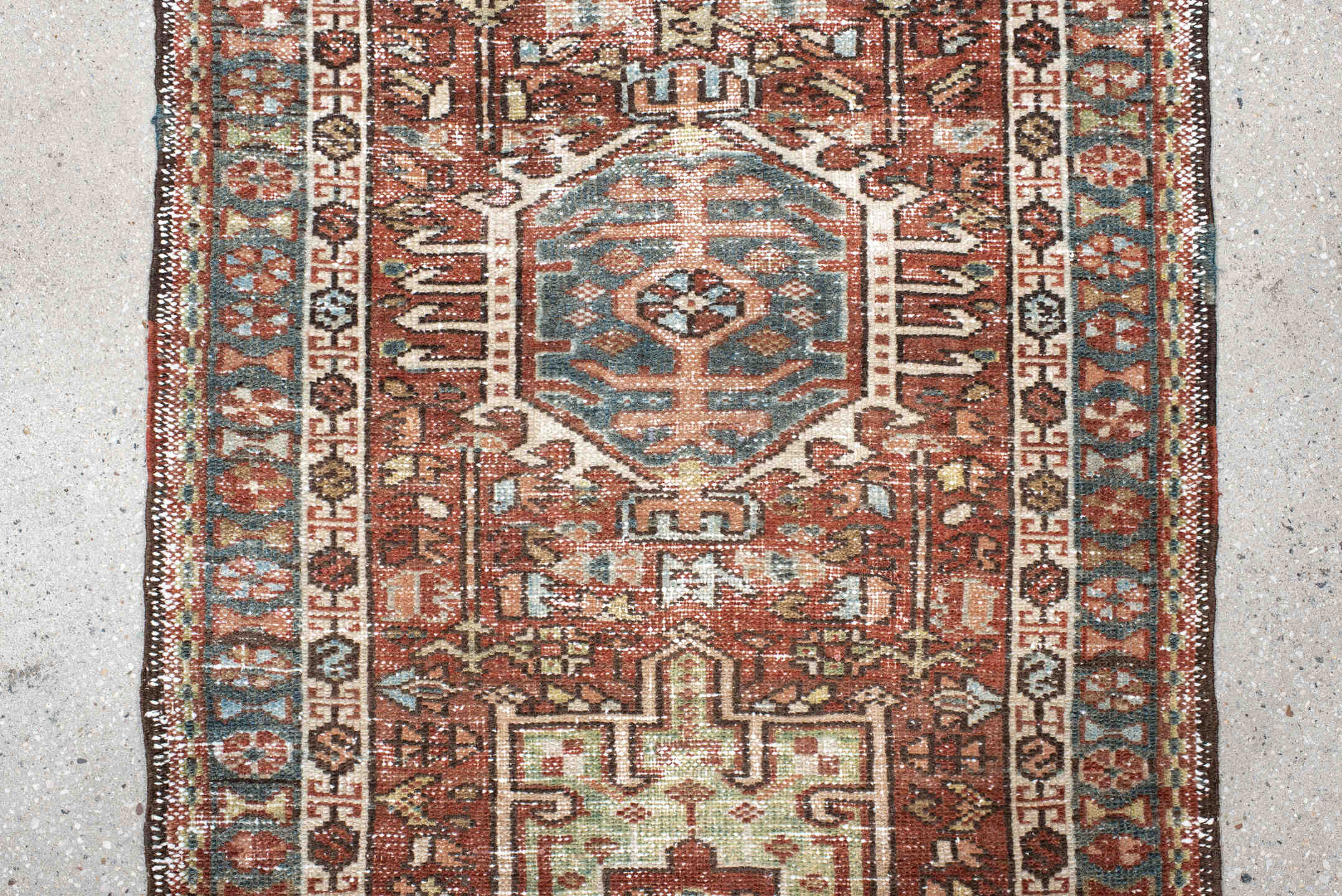 2' x 3' one-of-a-kind handmade vintage Karaje small size rug. Color palette: rust, ivory, blue, brown, sage, charcoal