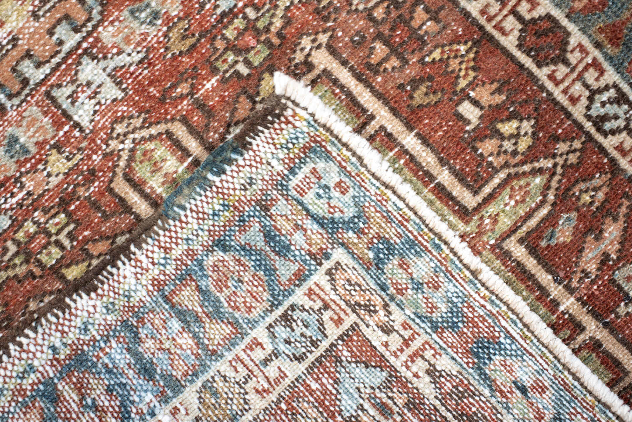 2' x 3' one-of-a-kind handmade vintage Karaje small size rug. Color palette: rust, ivory, blue, brown, sage, charcoal