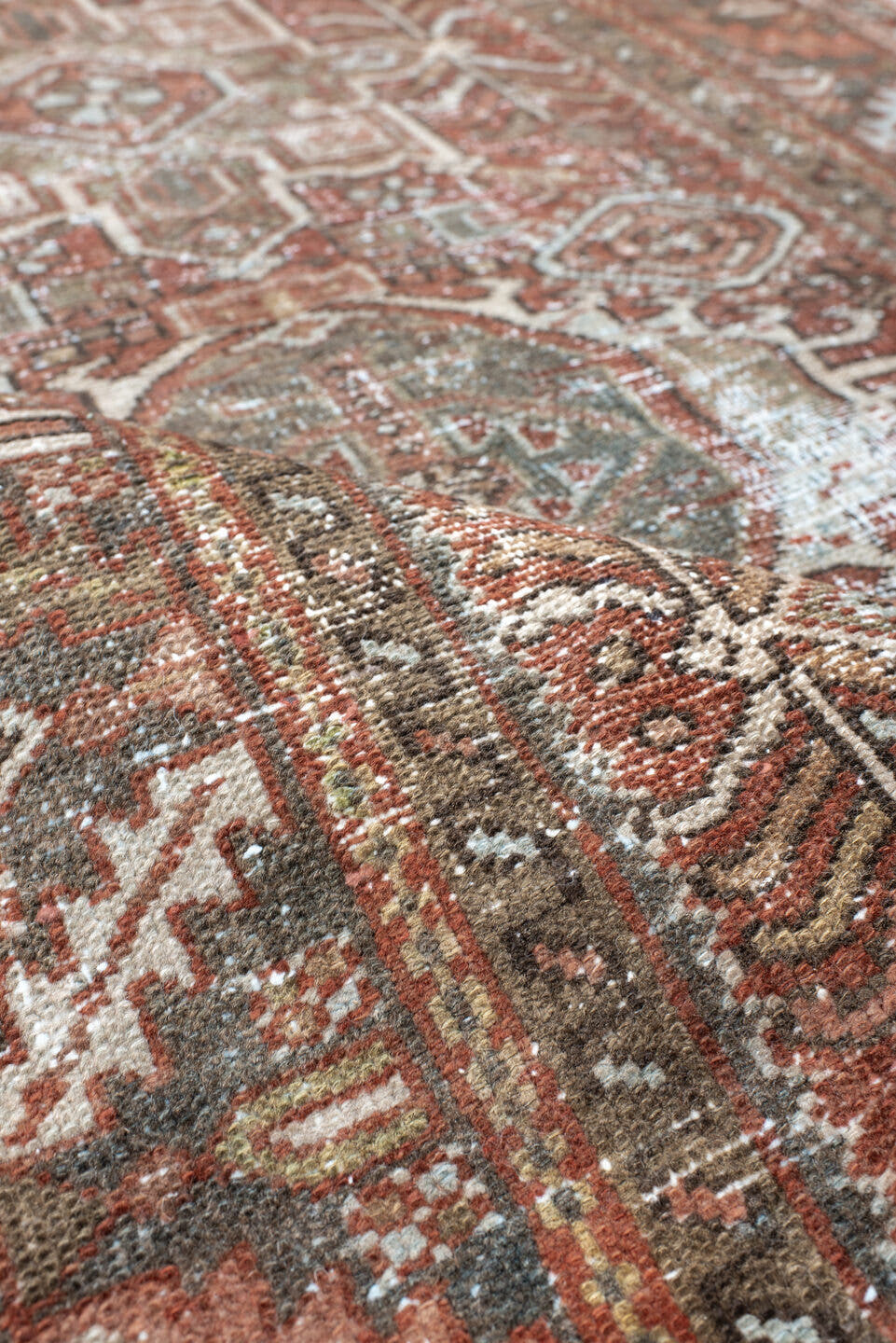 3' x 4' one-of-a-kind handmade antique Karaje small size rug. Color palette: rust, sage, ivory, charcoal, terra cotta, taupe