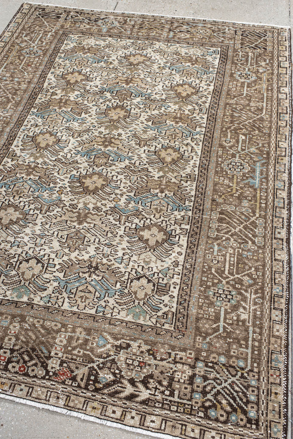 4' x 6' one-of-a-kind handmade antique Karaje small size rug. Color palette: ivory, taupe, brown, sky blue, charcoal, camel