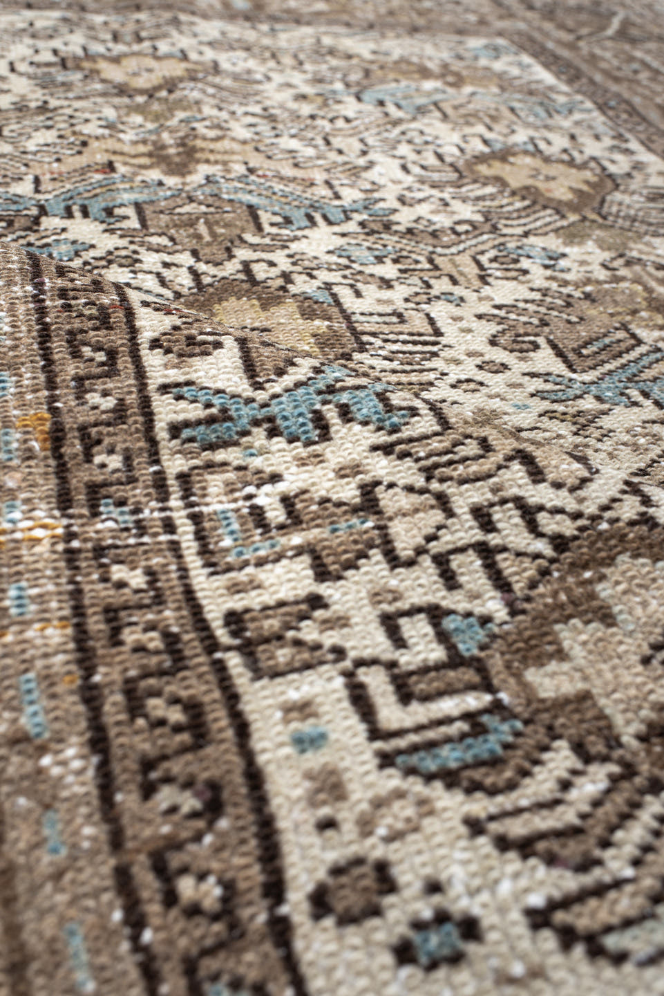 4' x 6' one-of-a-kind handmade antique Karaje small size rug. Color palette: ivory, taupe, brown, sky blue, charcoal, camel