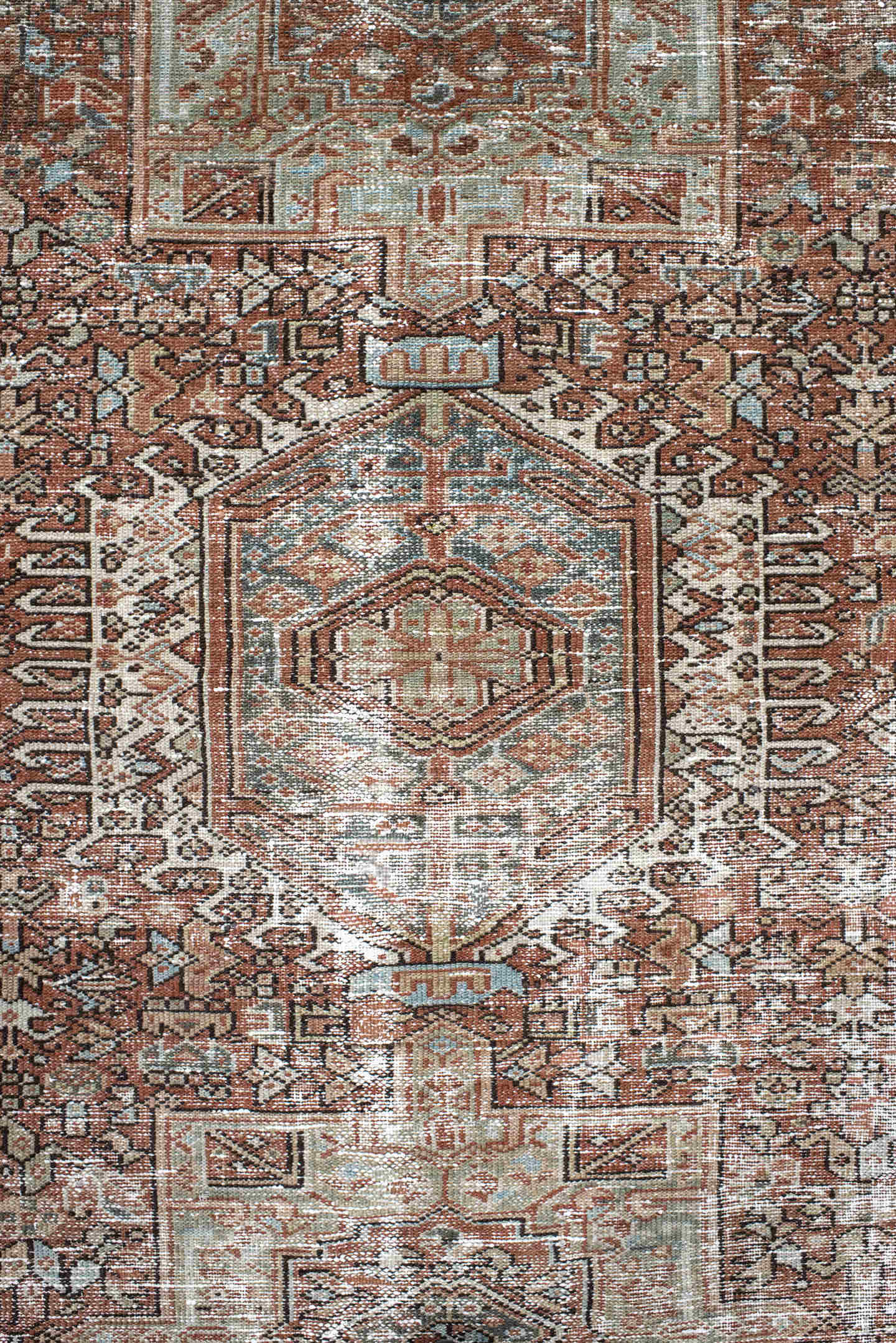4' x 5' one-of-a-kind handmade antique Karaje small size rug. Color palette: rust, ivory, sage, charcoal, terra cotta, taupe