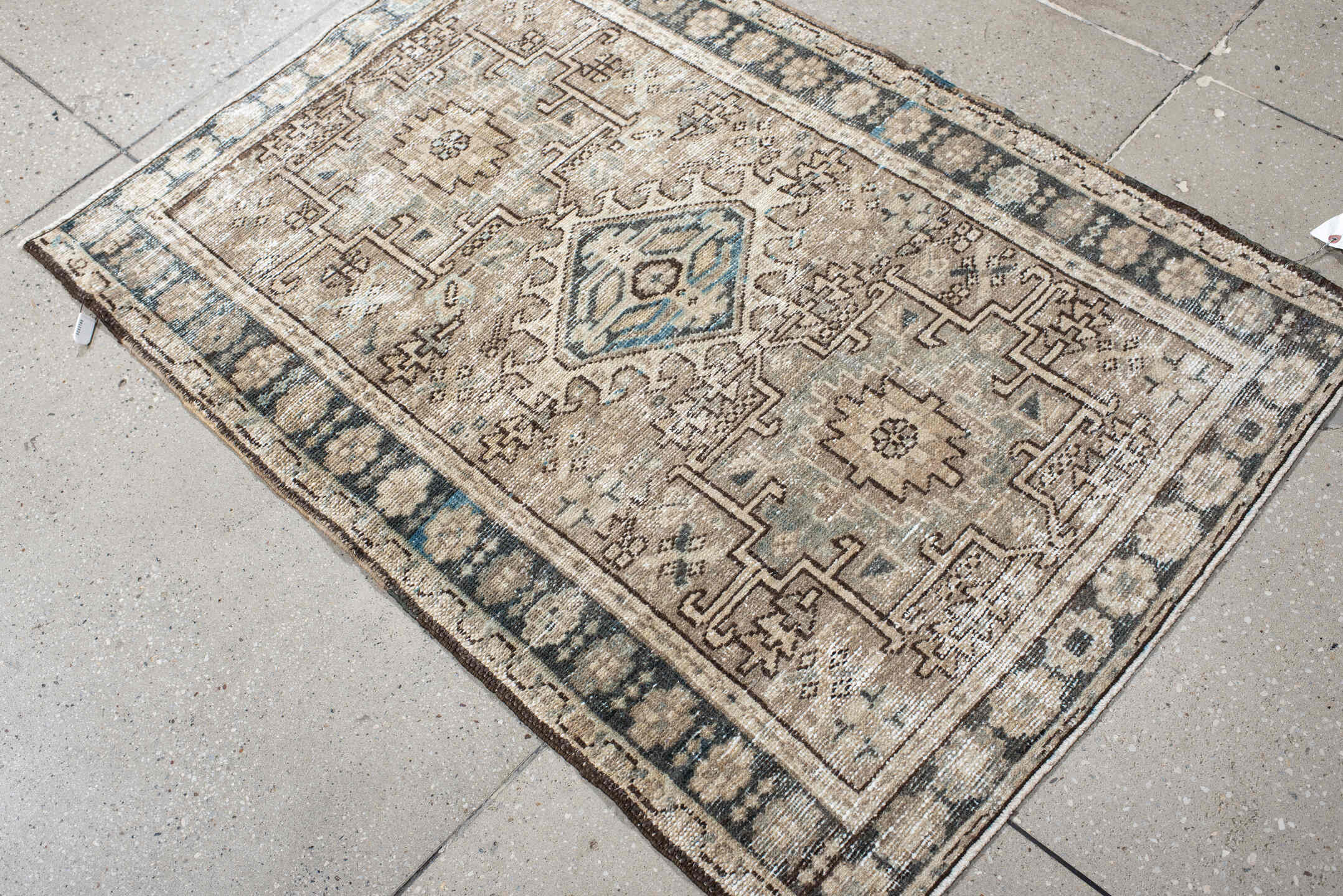 2' x 4' one-of-a-kind handmade vintage Karaje small size rug. Color palette: antiquewhite, black, blue, brown, charcoal