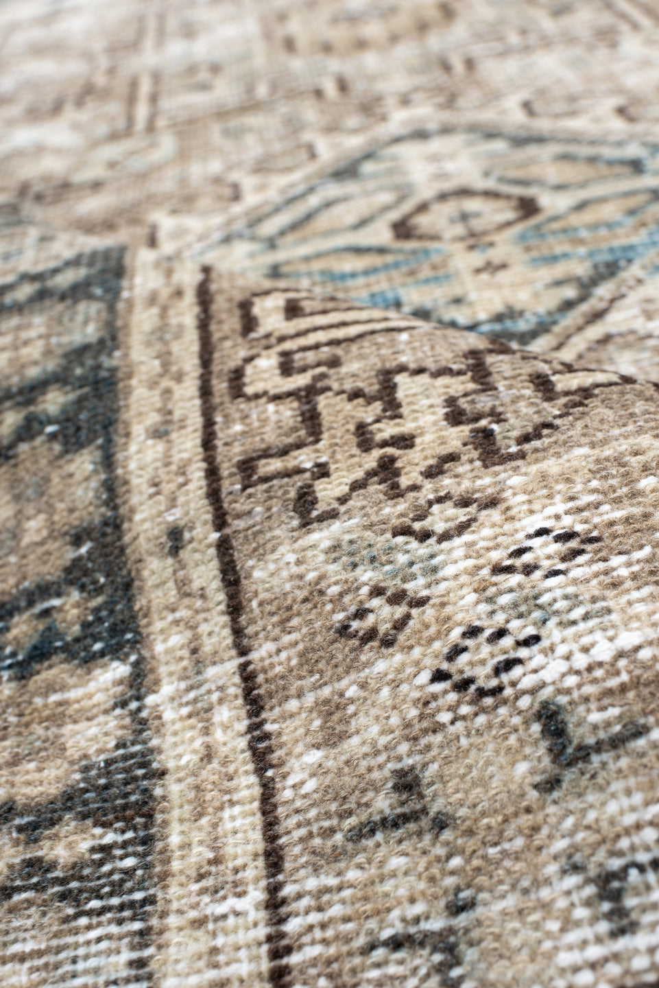 2' x 4' one-of-a-kind handmade vintage Karaje small size rug. Color palette: antiquewhite, black, blue, brown, charcoal